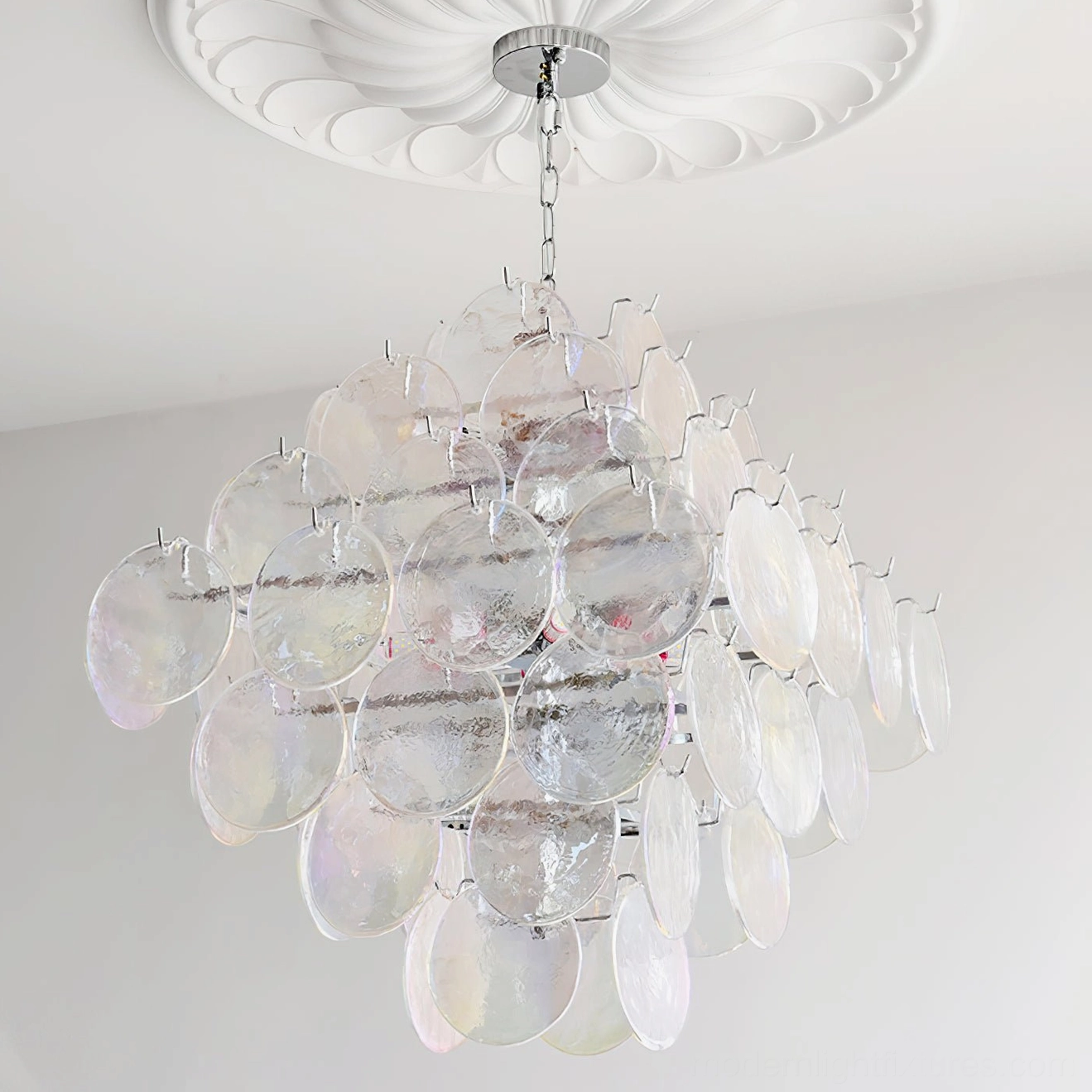 Contemporary glass disc chandelier sculptural artistic view emphasizing cascading design and visual impact