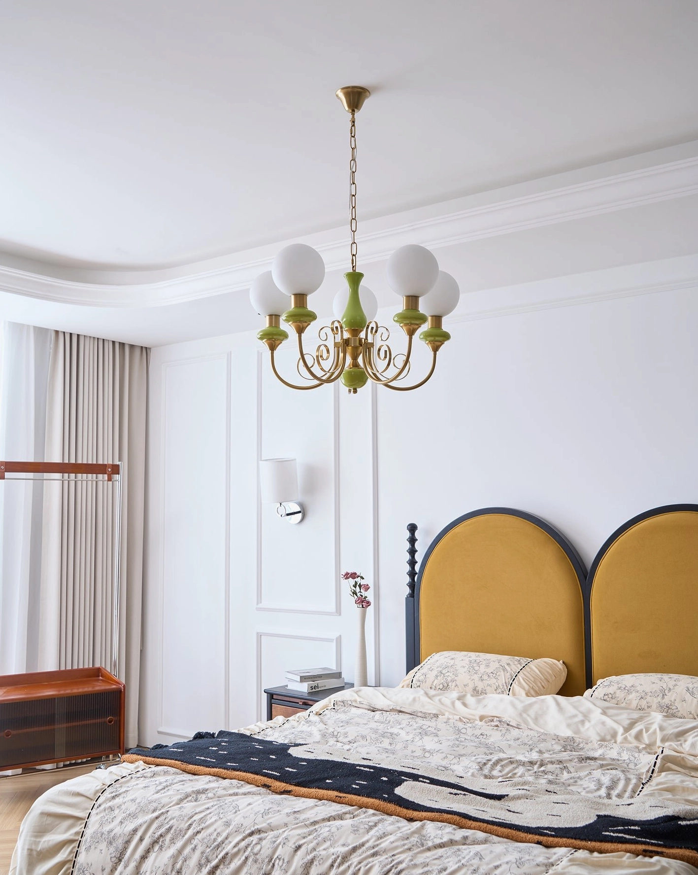 Contemporary glass pendant chandelier with multiple frosted light shades overhead