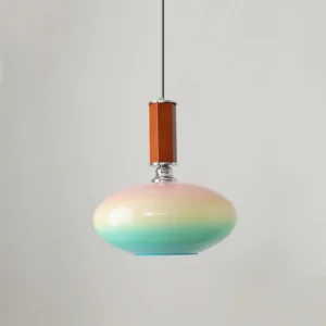 Contemporary gradient pendant light with milky white glass shade, overhead angle showing geometric disc form