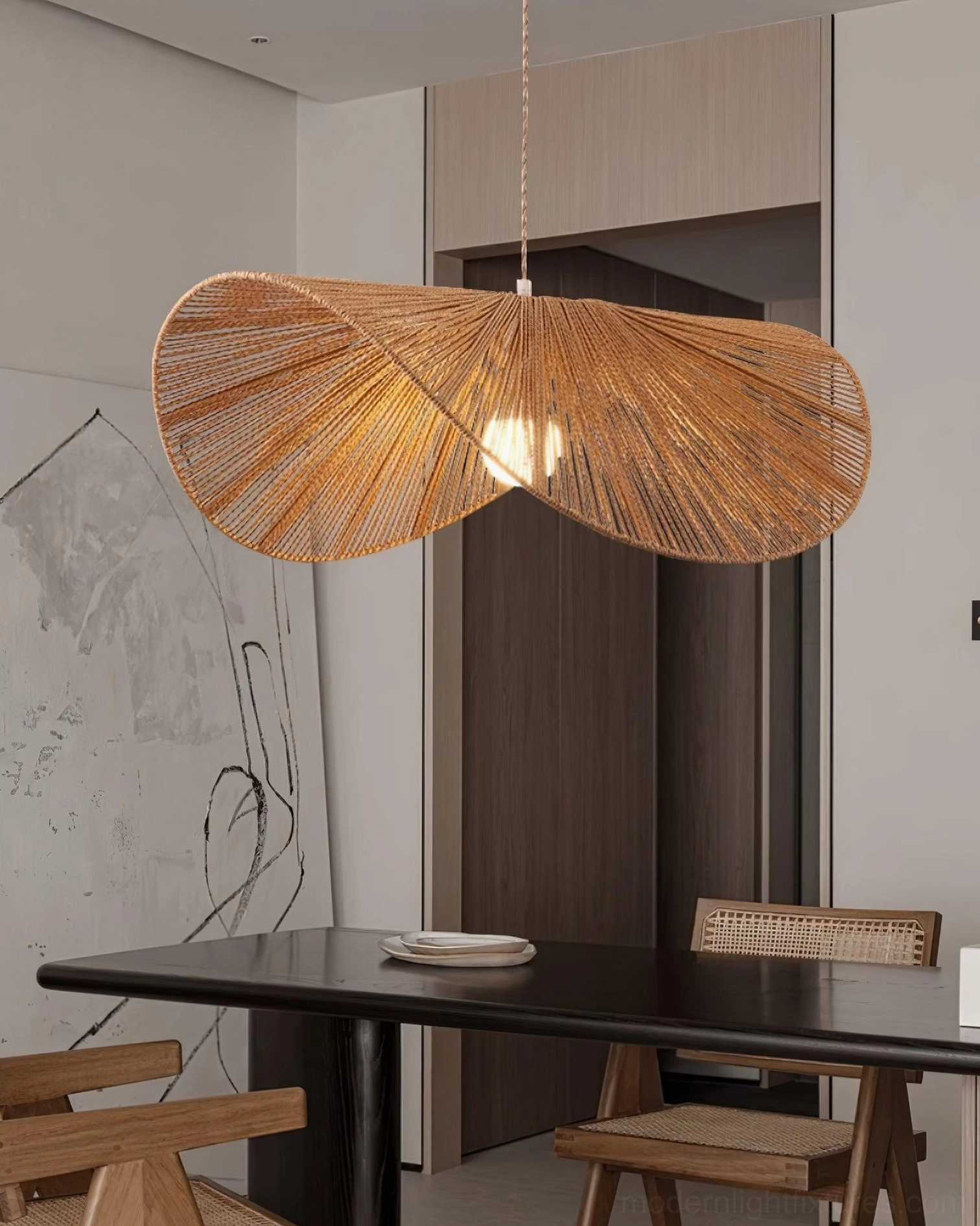 Handwoven natural rope straw hat pendant lamp in contemporary styled residential interior