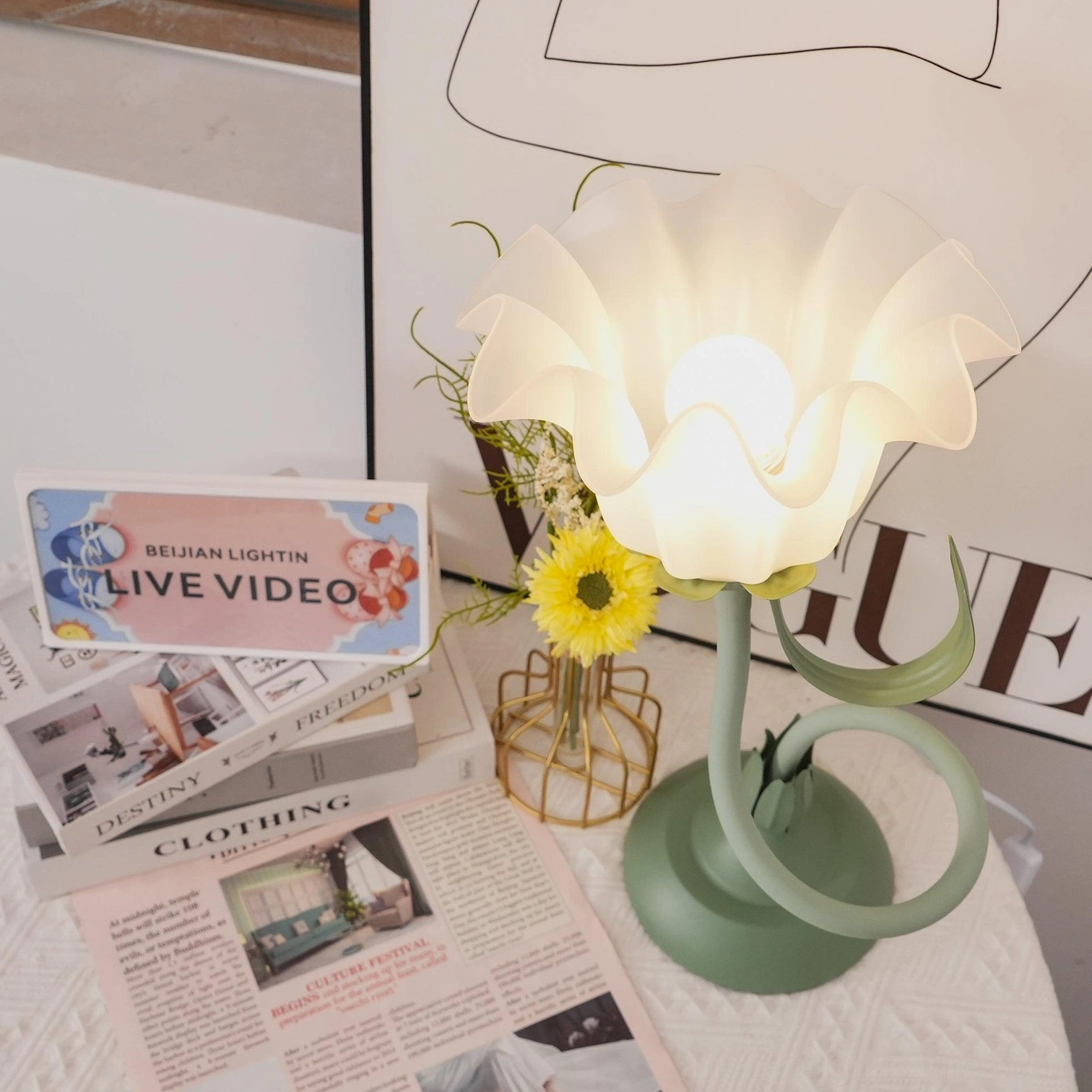 Contemporary lily flower table lamp with three-color changing light function displayed