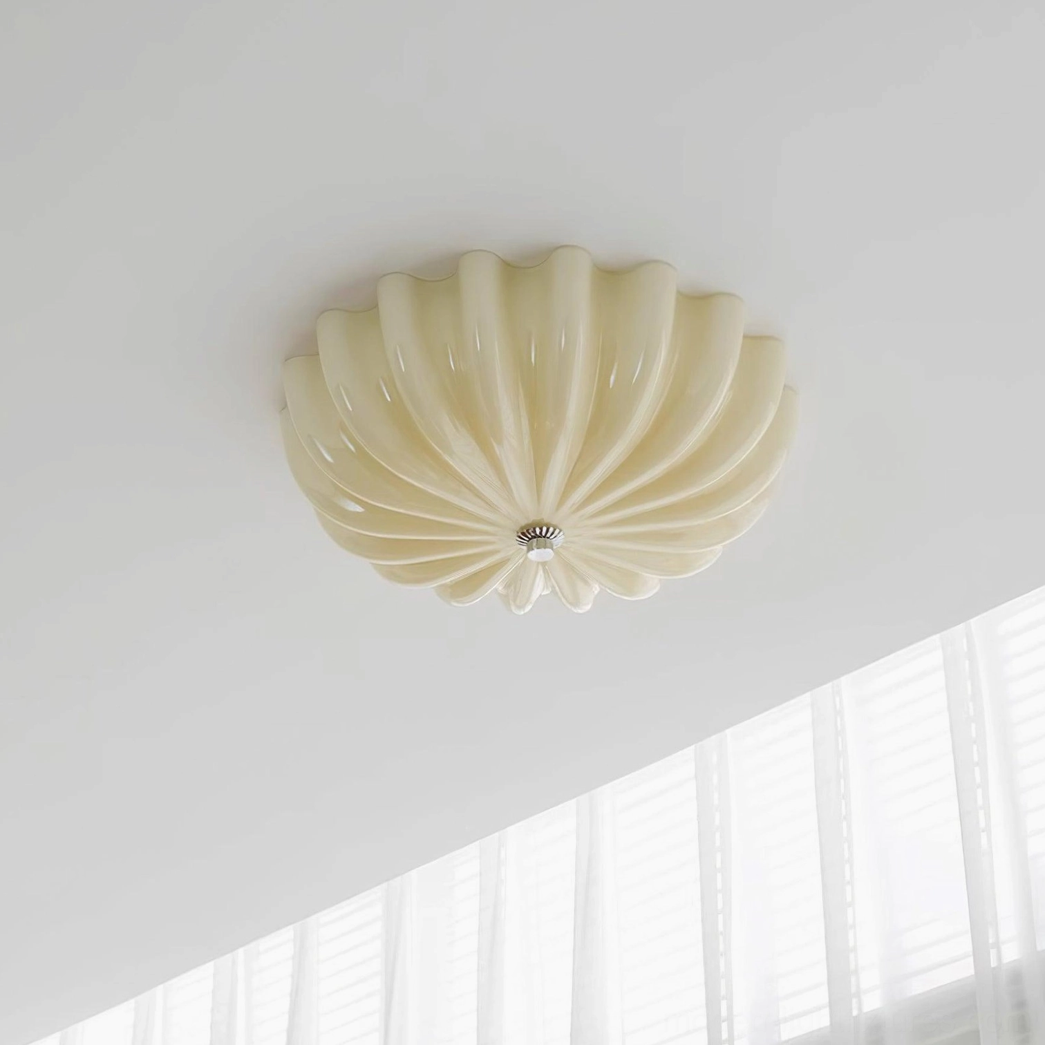 Contemporary living room interior with installed jelly shell ceiling light fixture, modern minimalist style
