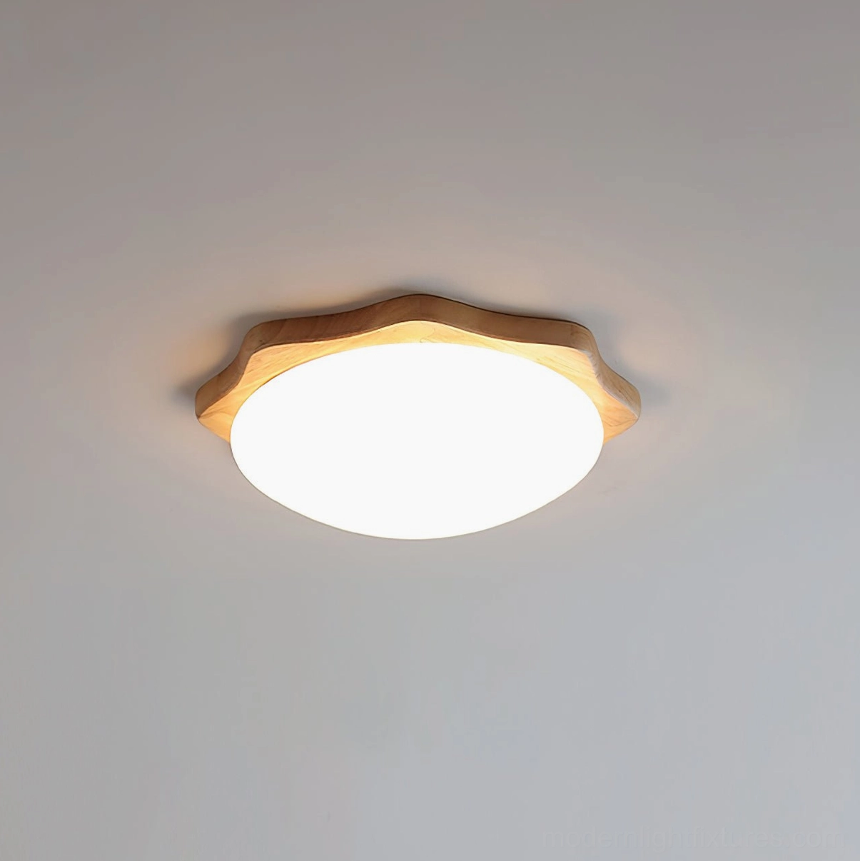 Wavy maple wood flush mount ceiling light in contemporary farmhouse bedroom creating warm ambient lighting environment