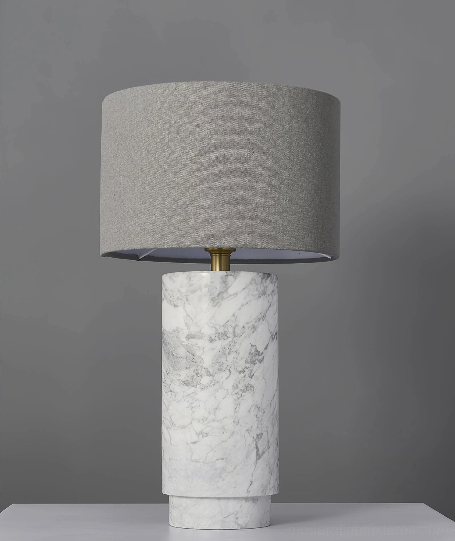 Contemporary marble table lamp accent piece with refined proportions and geometric cylindrical form