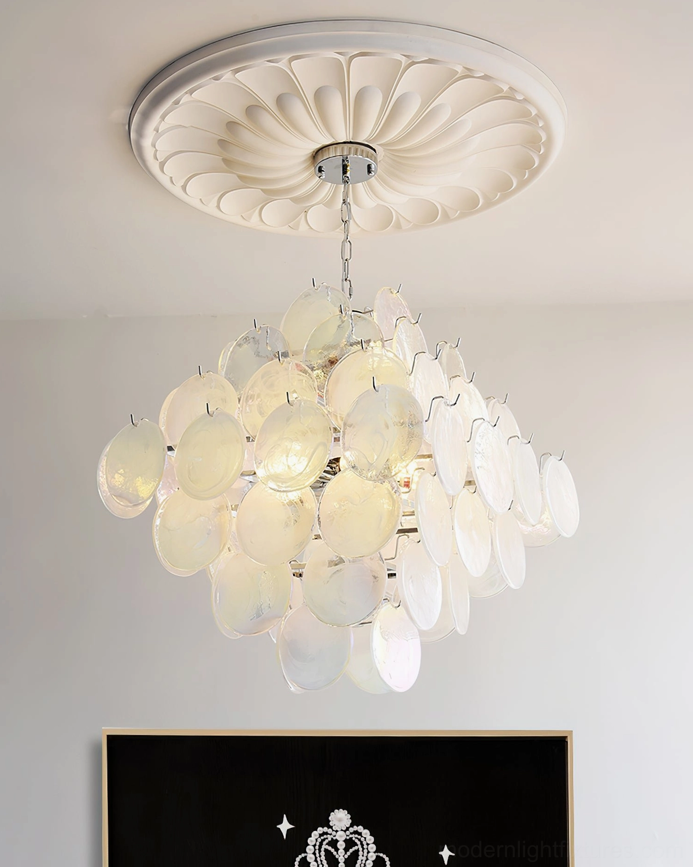 Contemporary Murano glass disc chandelier bedroom installation view creating sophisticated ambiance lighting