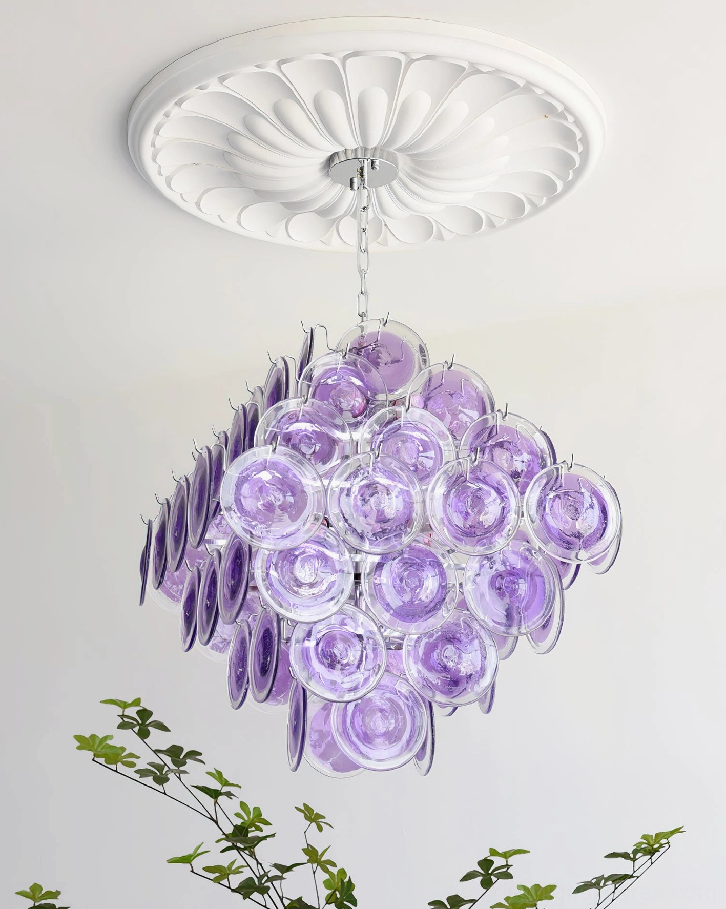 Contemporary Murano glass disc chandelier illuminated view displaying light refraction through hand-blown discs