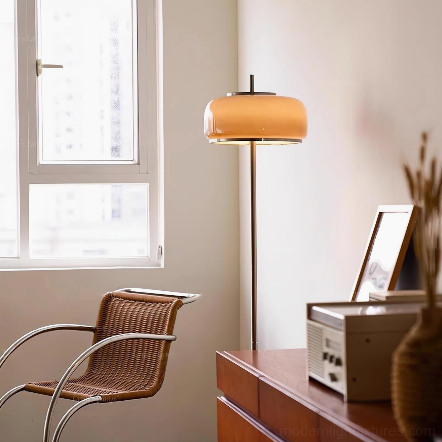 Contemporary mushroom floor lamp in living room setting demonstrating warm ambient lighting and sculptural design presence