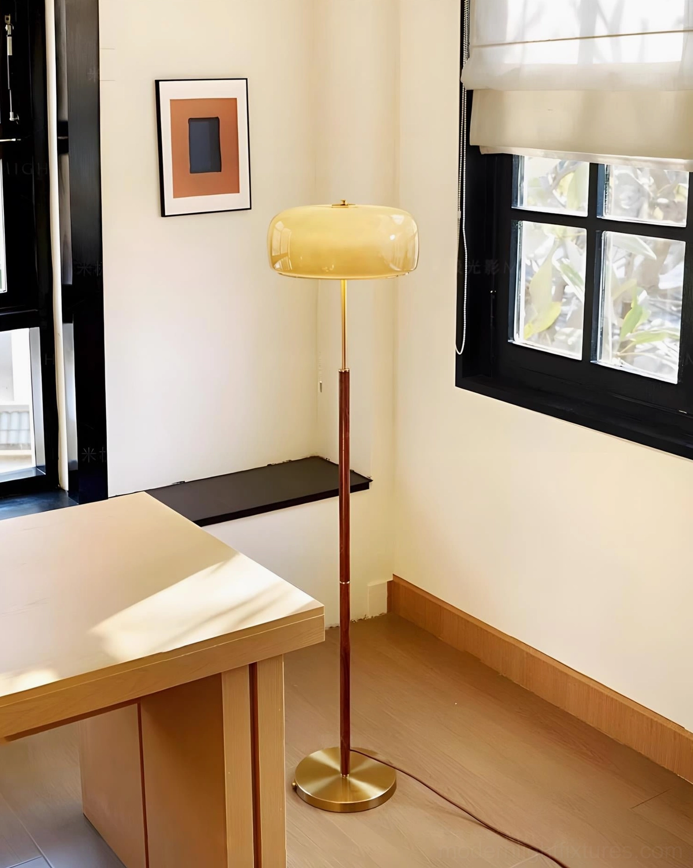 Contemporary mushroom floor lamp with light yellow shade in home office with black window frame