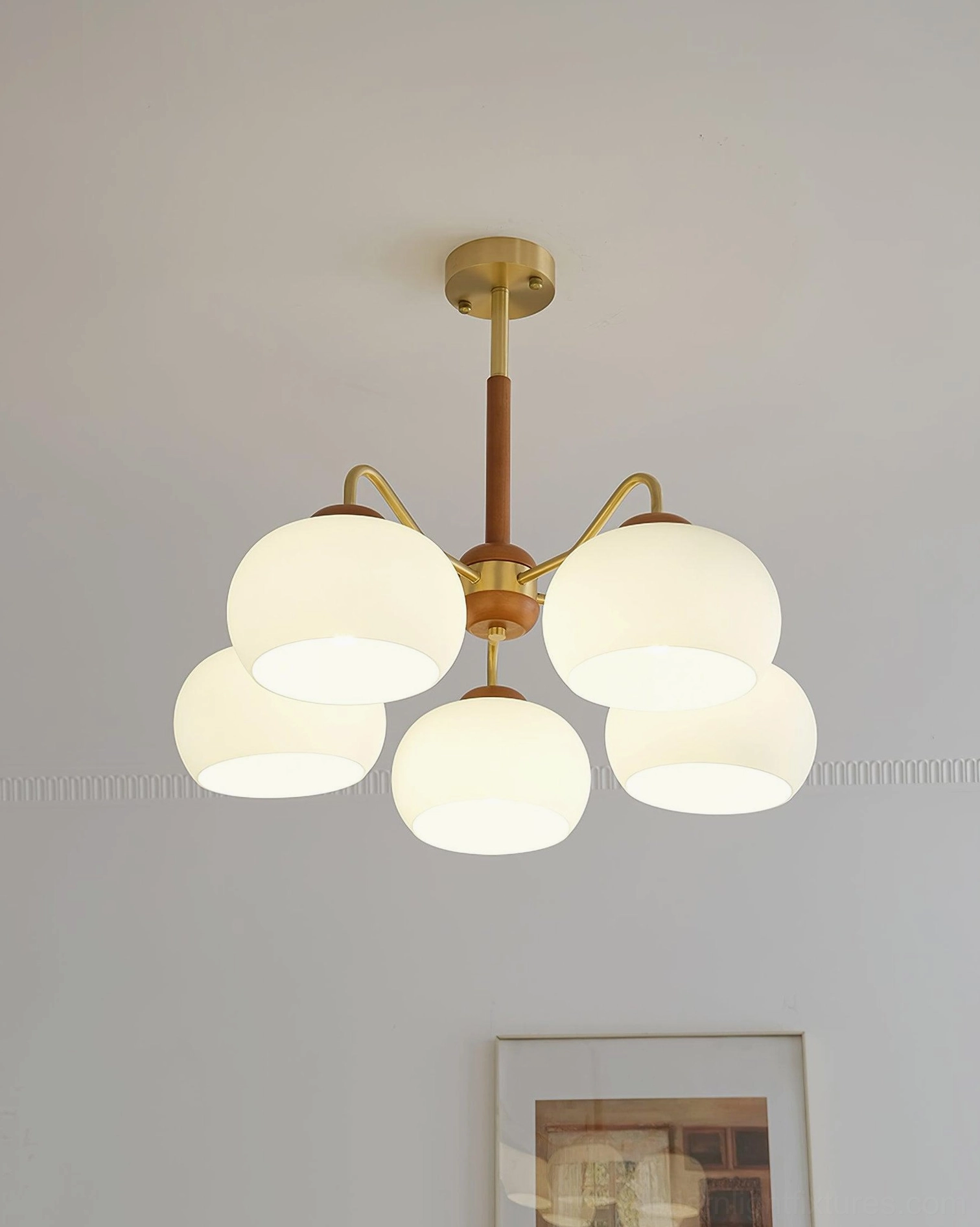 Contemporary Nordic glass chandelier with warm brass and wood materials architectural lighting fixture