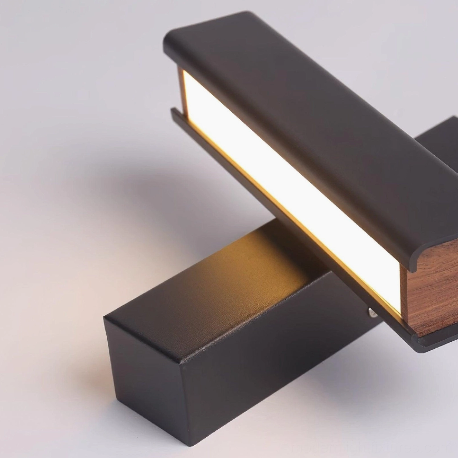 Contemporary Nordic wall sconce showing rotatable head design and space-saving narrow profile
