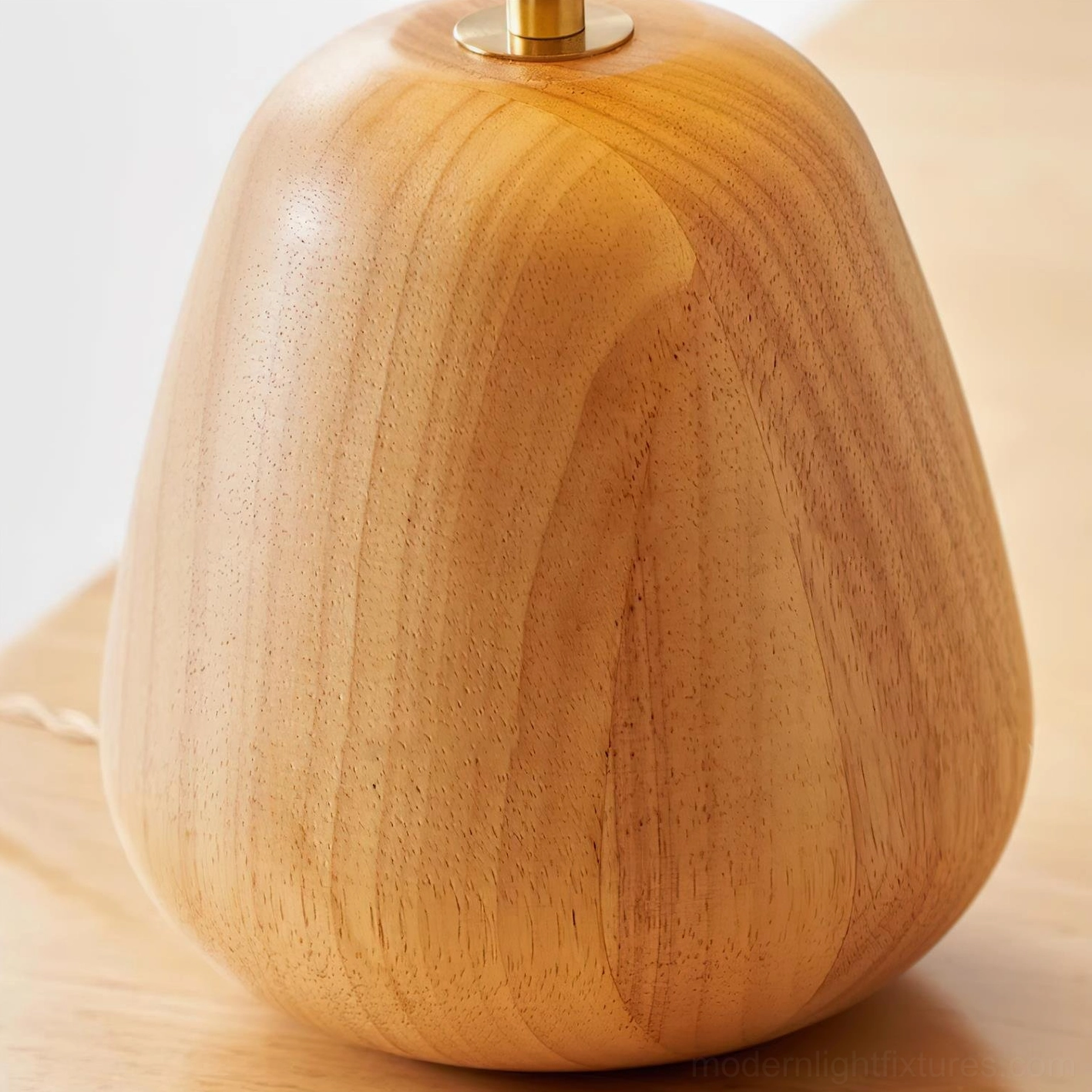 Contemporary oak wood table lamp with mushroom silhouette in modern minimalist home setting