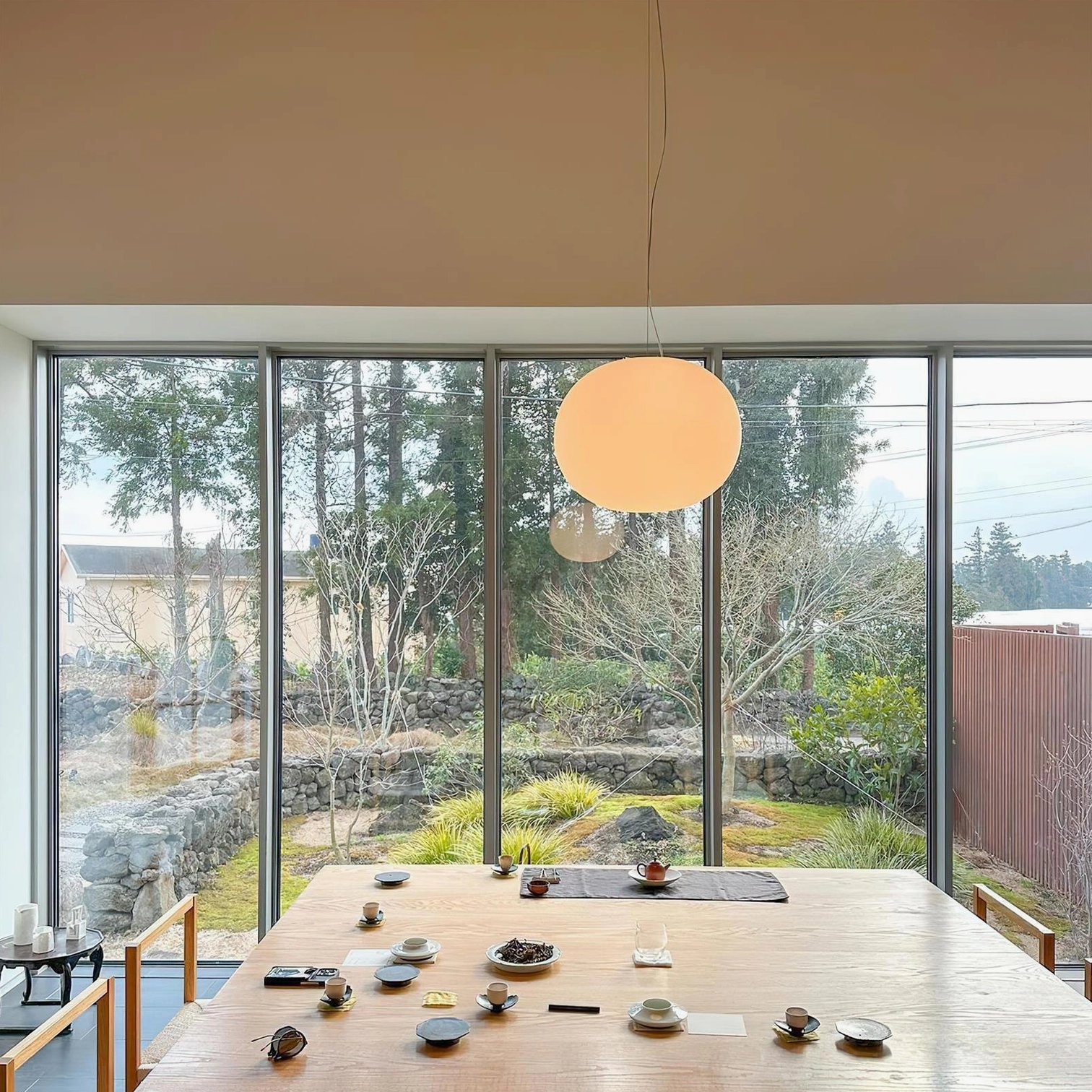 Contemporary frosted glass sphere pendant light - minimalist hanging fixture with organic spherical design