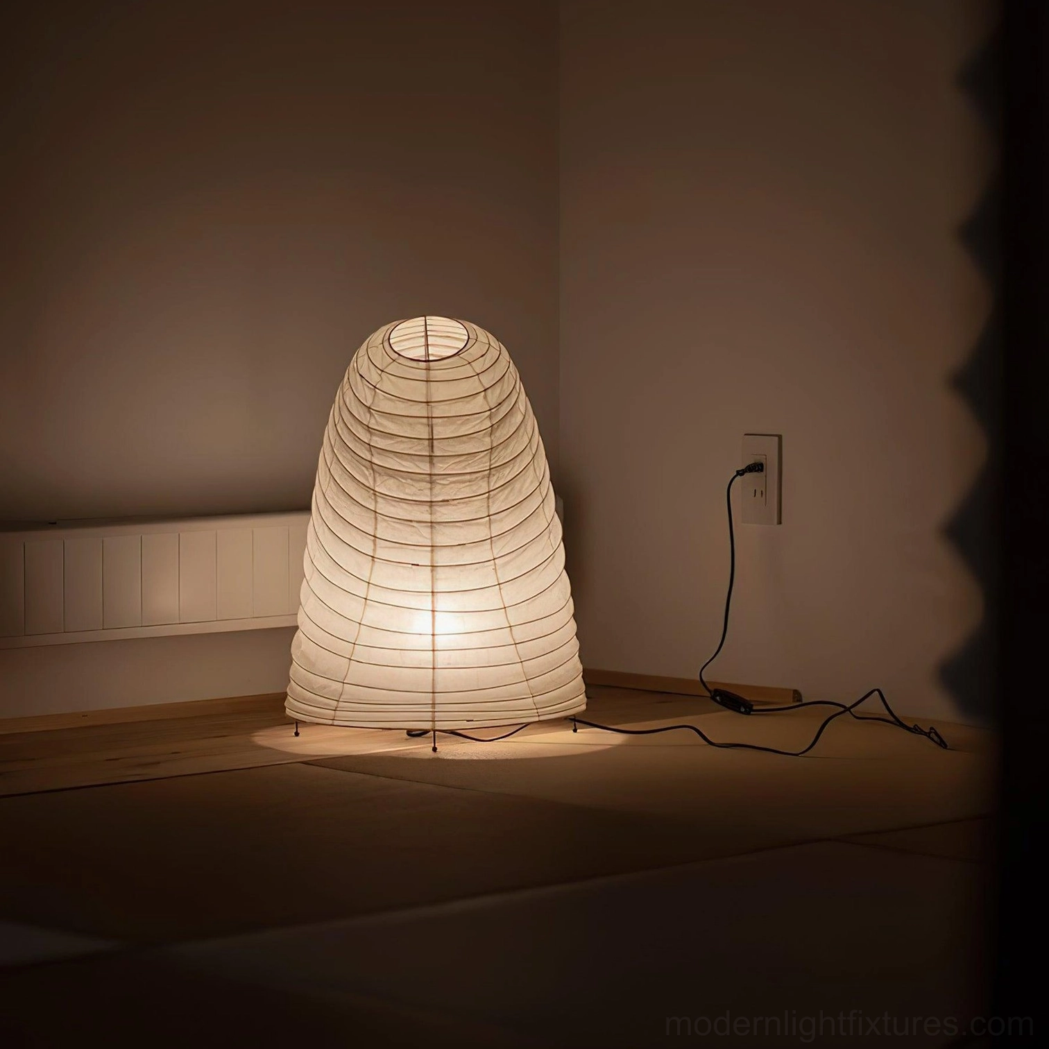Contemporary minimalist paper table lamp full product view with black metal legs and cord