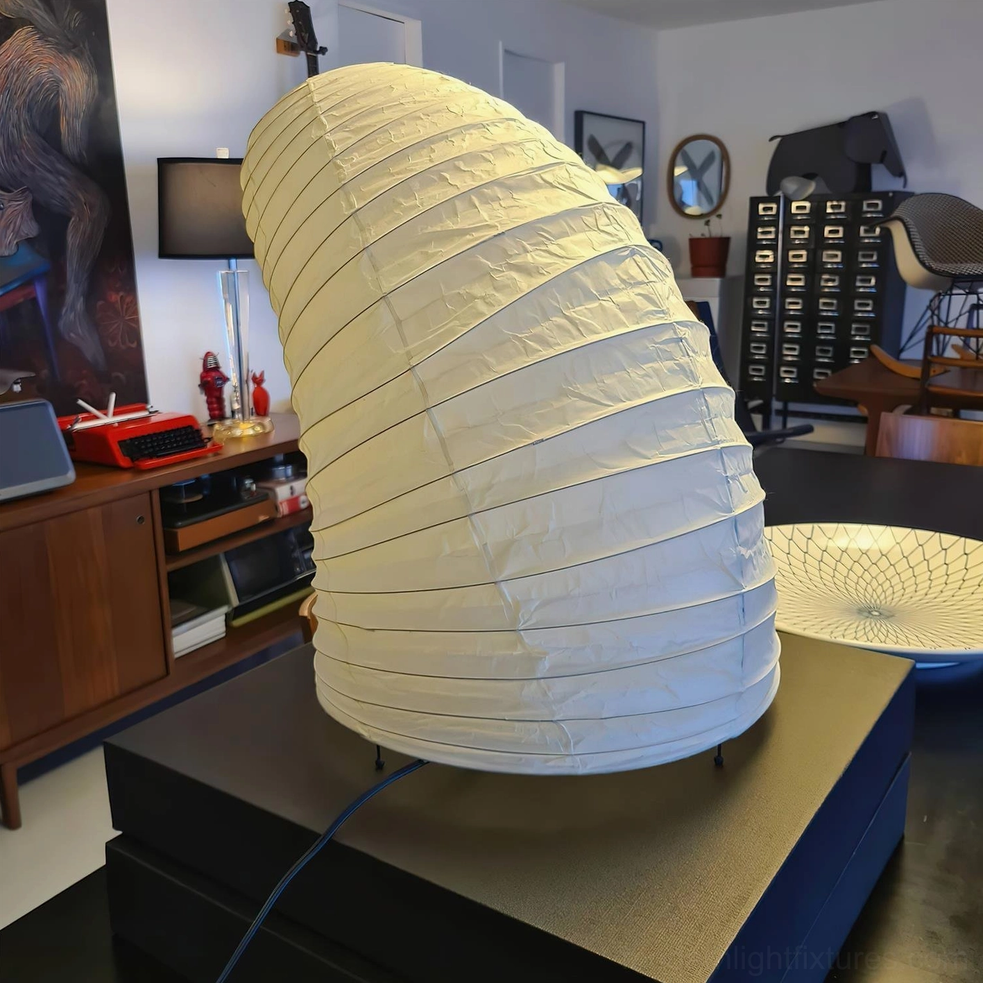 Large contemporary paper table lamp in modern living room with wooden furniture wabi-sabi style