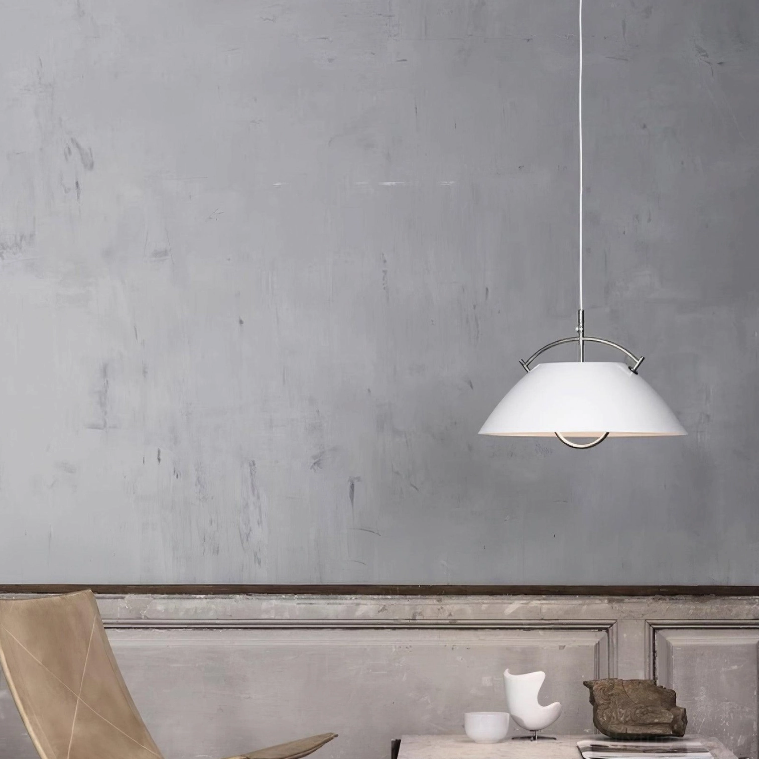 Contemporary pendant light fixture highlighting adjustable handle design and finish options