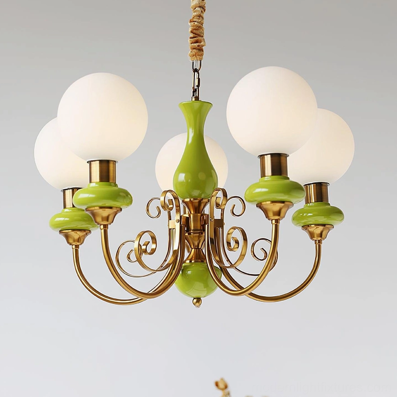 Contemporary pendant glass chandelier with gold frame and frosted white shades installed
