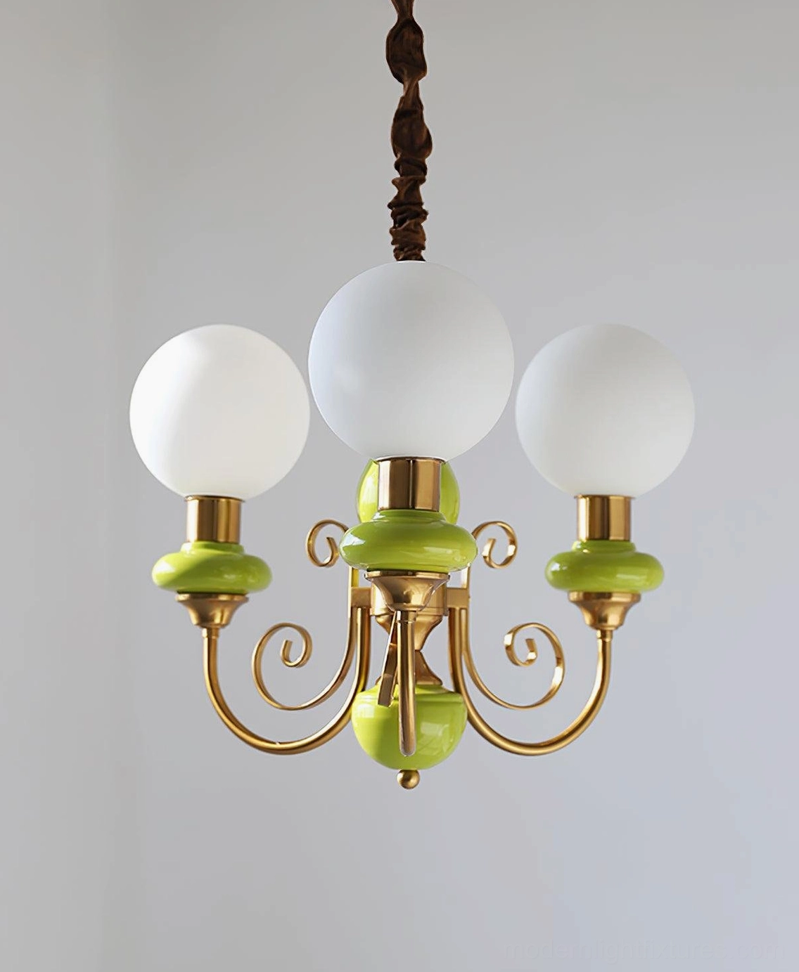 Contemporary pendant chandelier with spherical frosted glass and gold-toned arms
