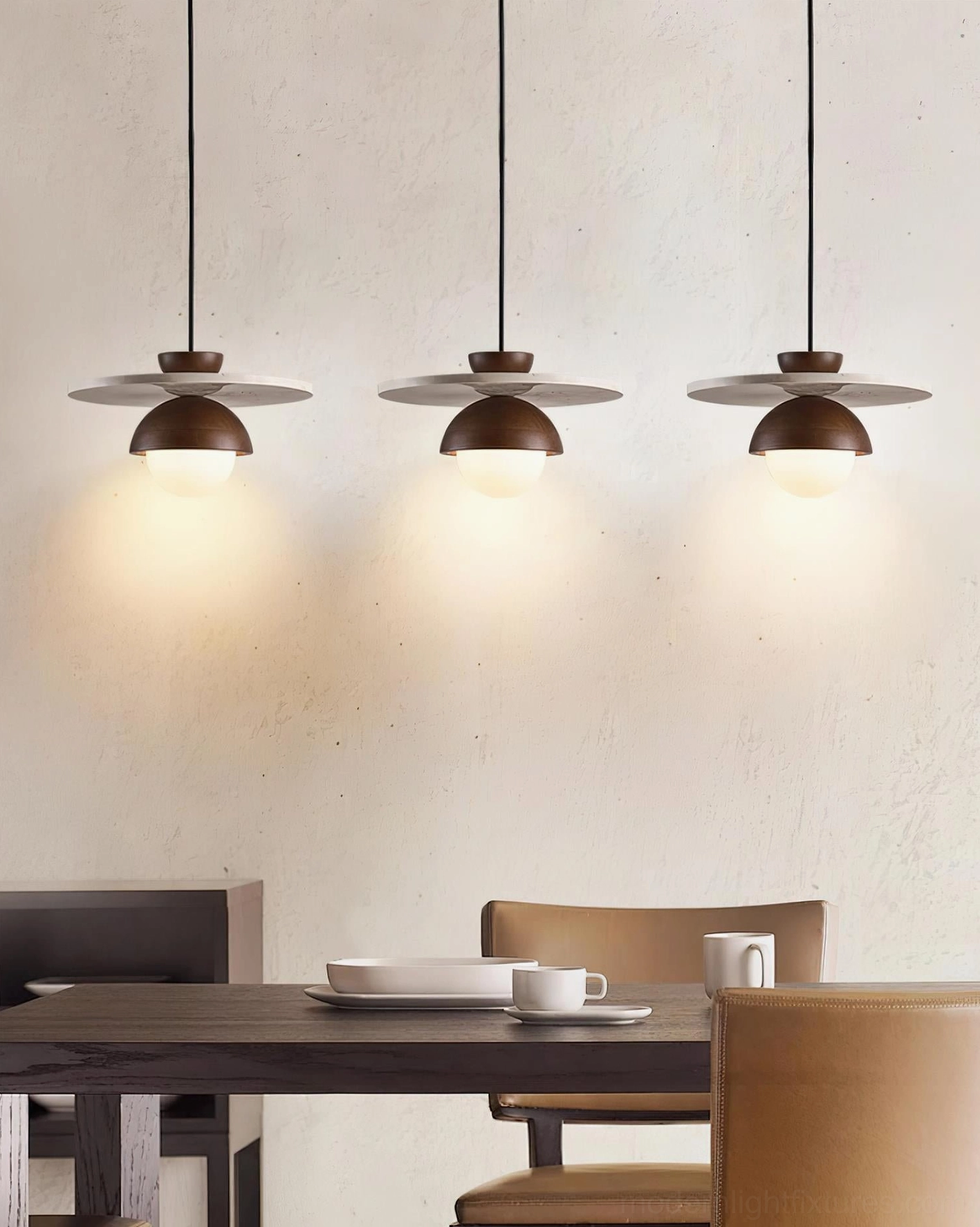 Contemporary pendant fixture detail showing frosted glass globe and stone construction