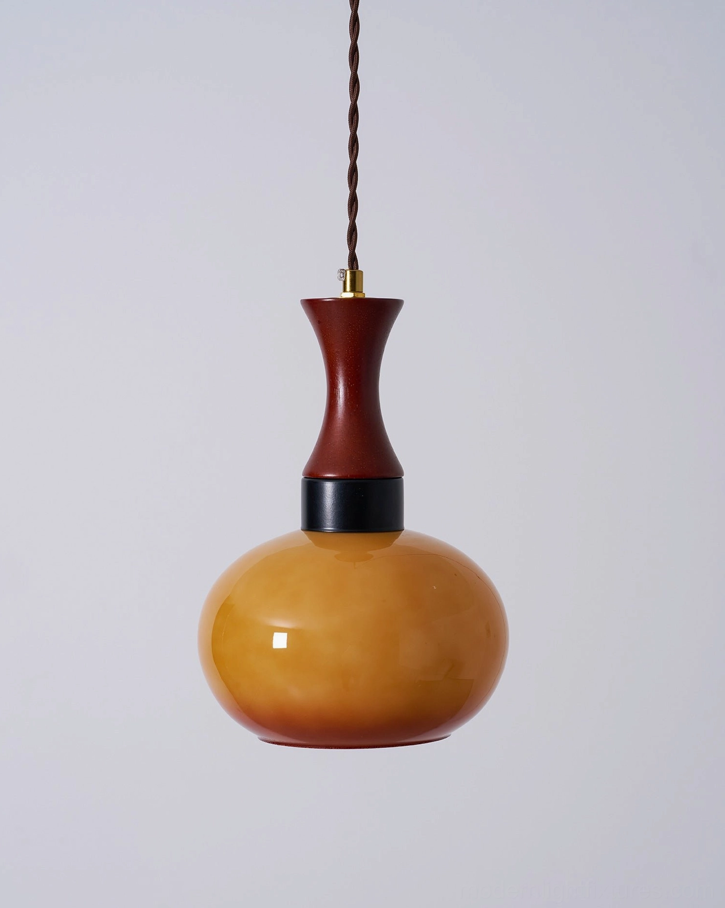 Contemporary pendant light with gourd-shaped silhouette and warm glass diffusion