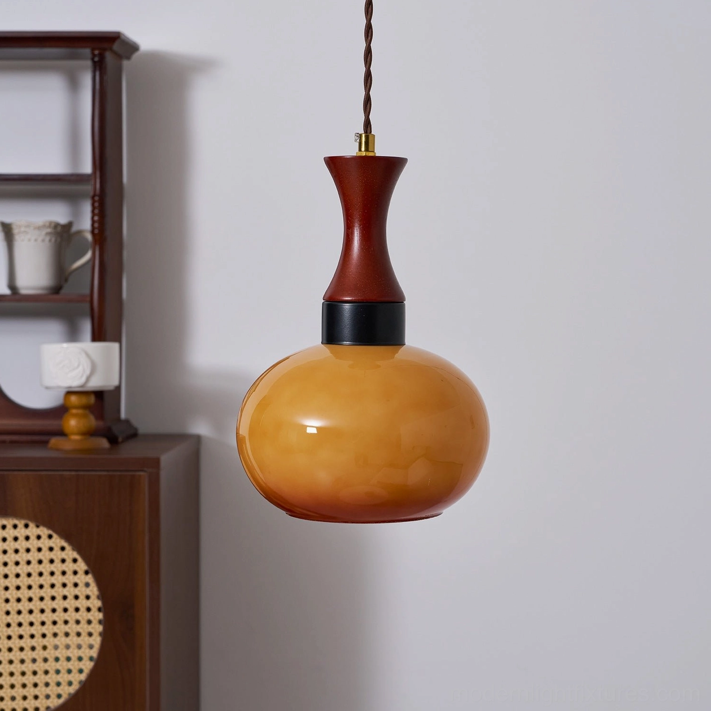 Contemporary plug-in pendant light creating ambient illumination in home interior