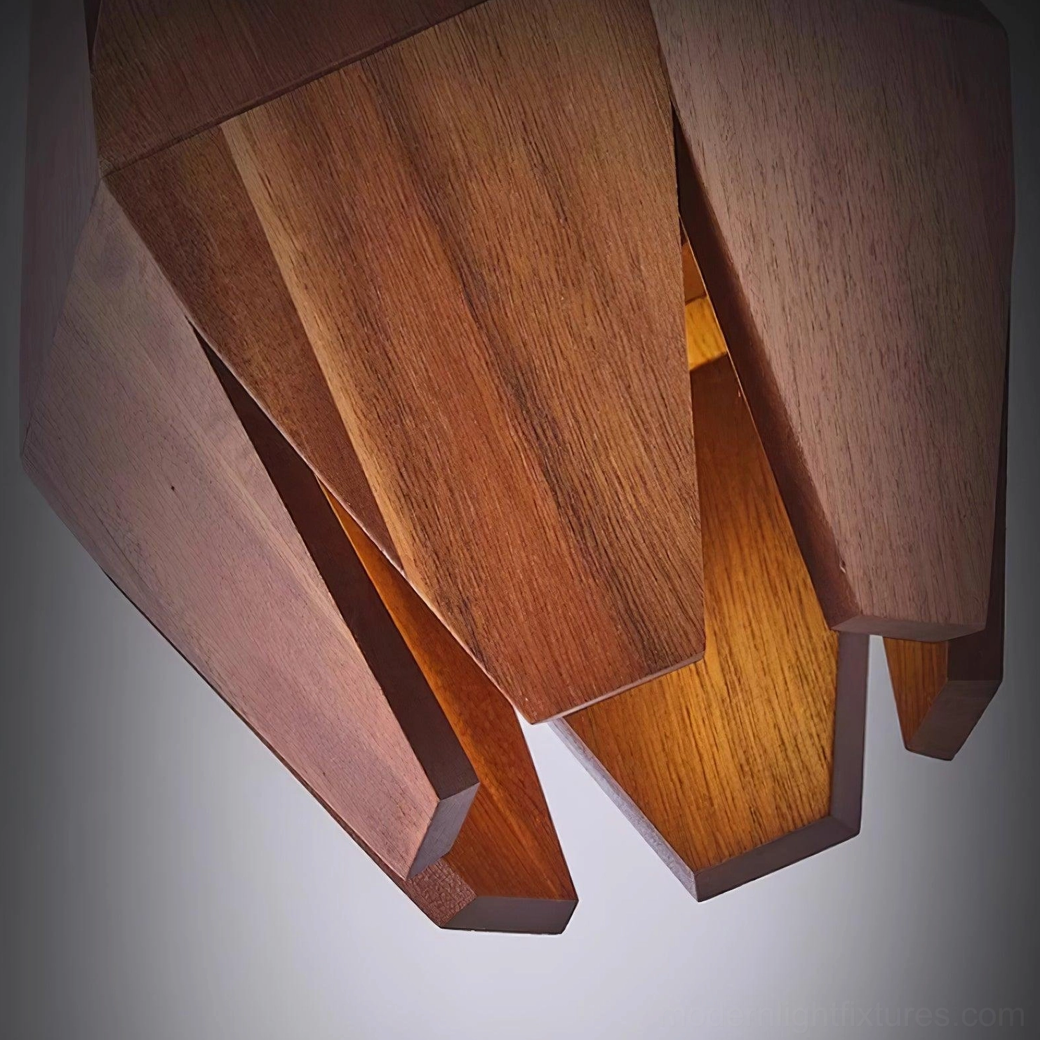 Contemporary pendant light with natural wood elements in minimalist interior design context