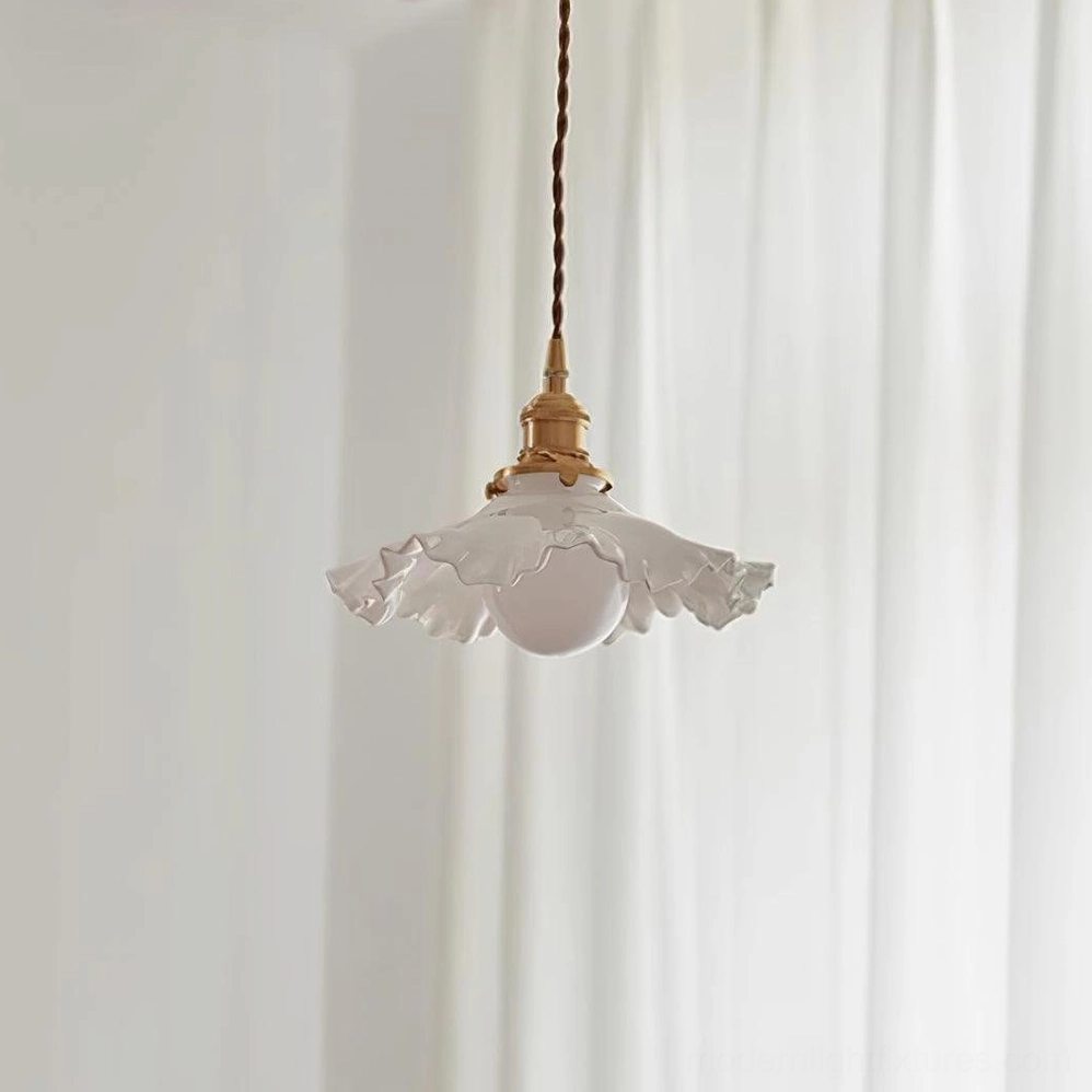 Contemporary ruffled pendant light with textured frosted glass shade, detailed product view