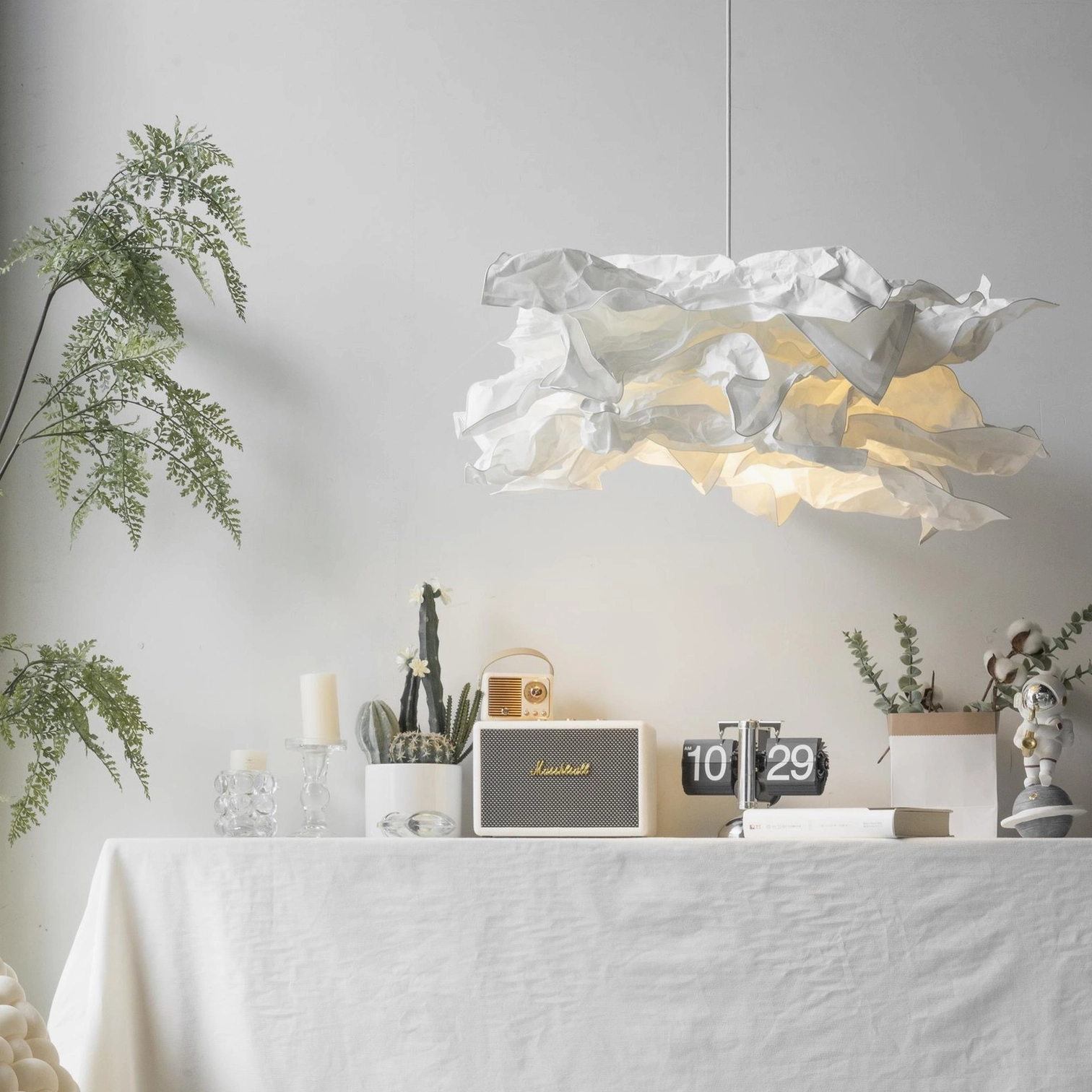 Contemporary sculptural paper pendant ceiling fixture with soft diffused light output