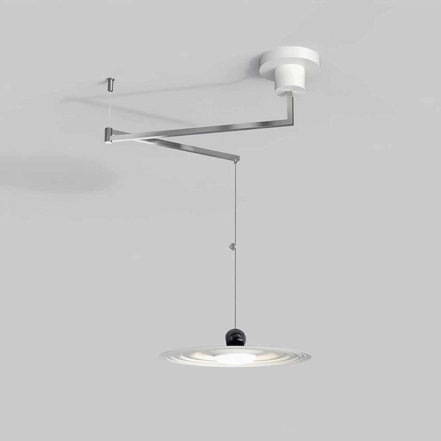 Modern swing arm pendant light with silver ceiling mount and minimalist design, architectural side angle