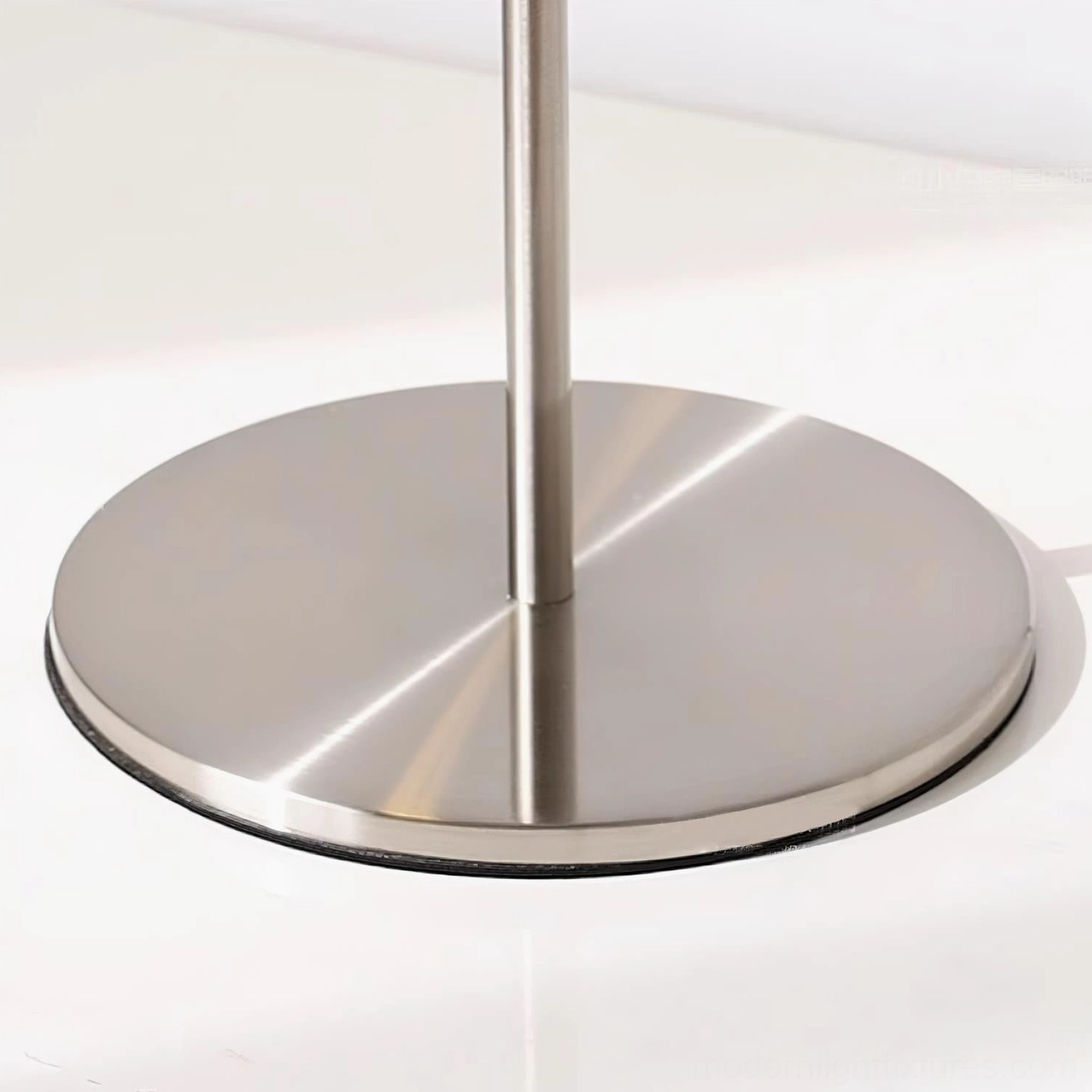 Contemporary table lamp featuring adjustable positioning perfect for reading bedside or workspace illumination