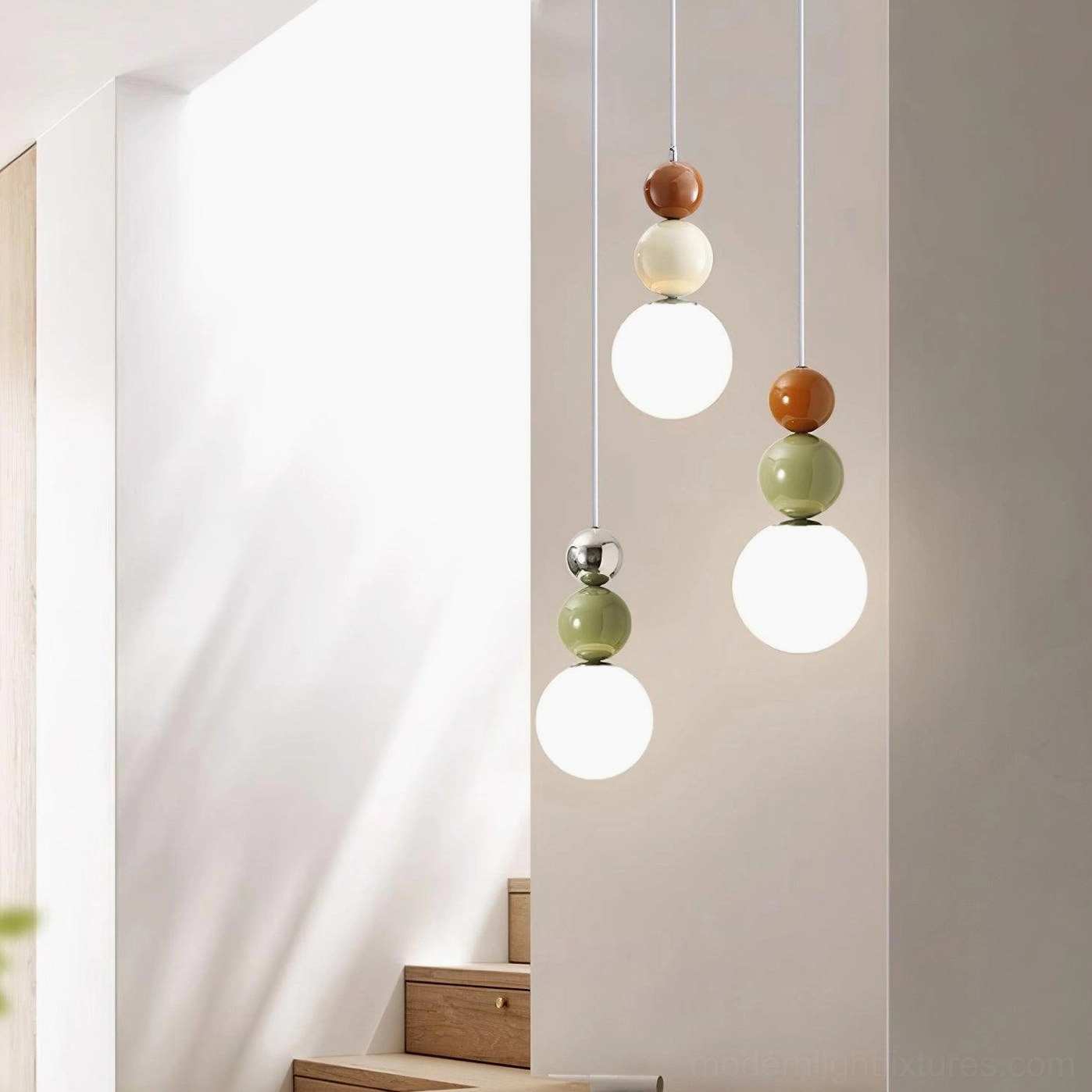 Modern three-ball pendant fixture designed for contemporary home lighting needs