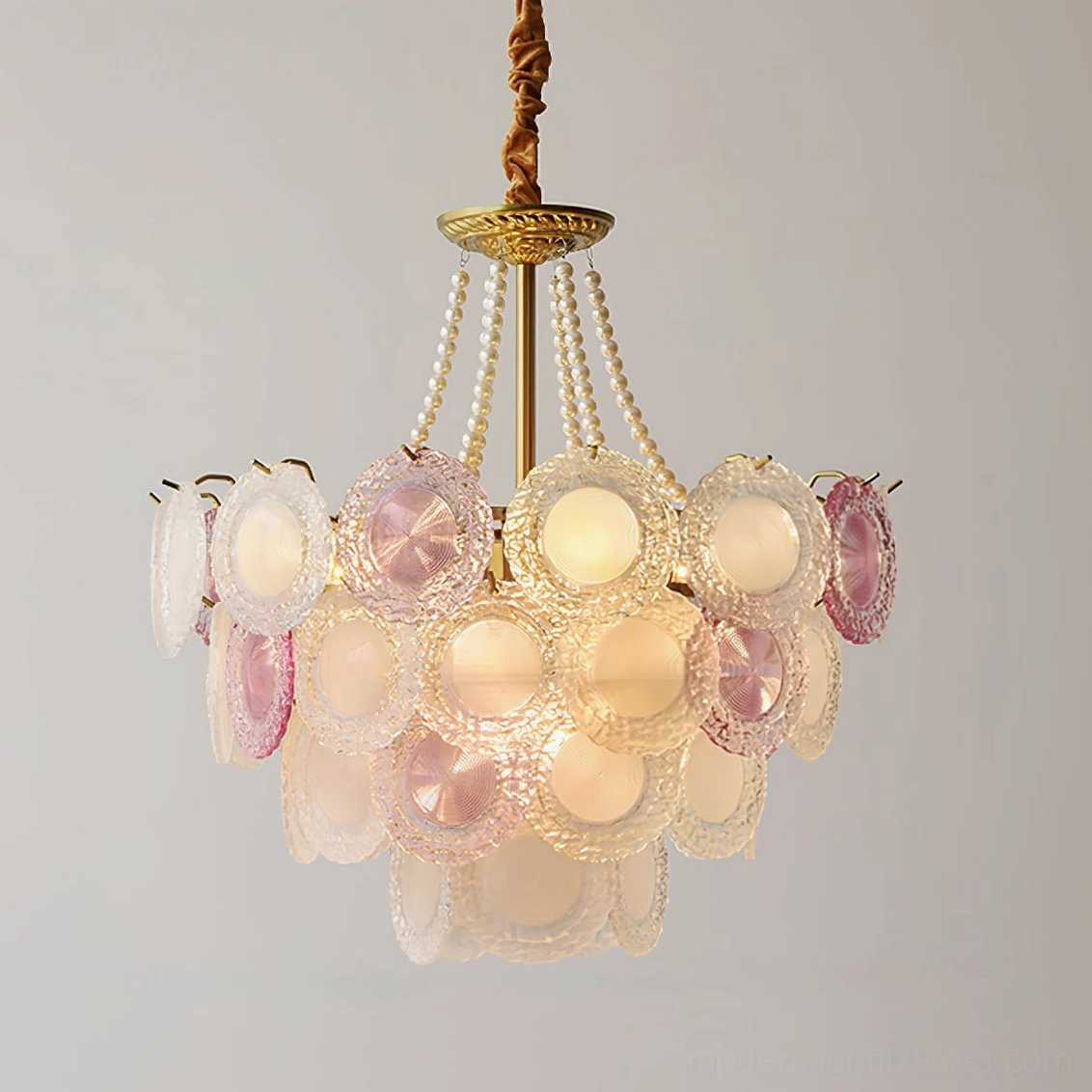 Contemporary pink tiered glass chandelier showing full sculptural silhouette and petal-like glass arrangement