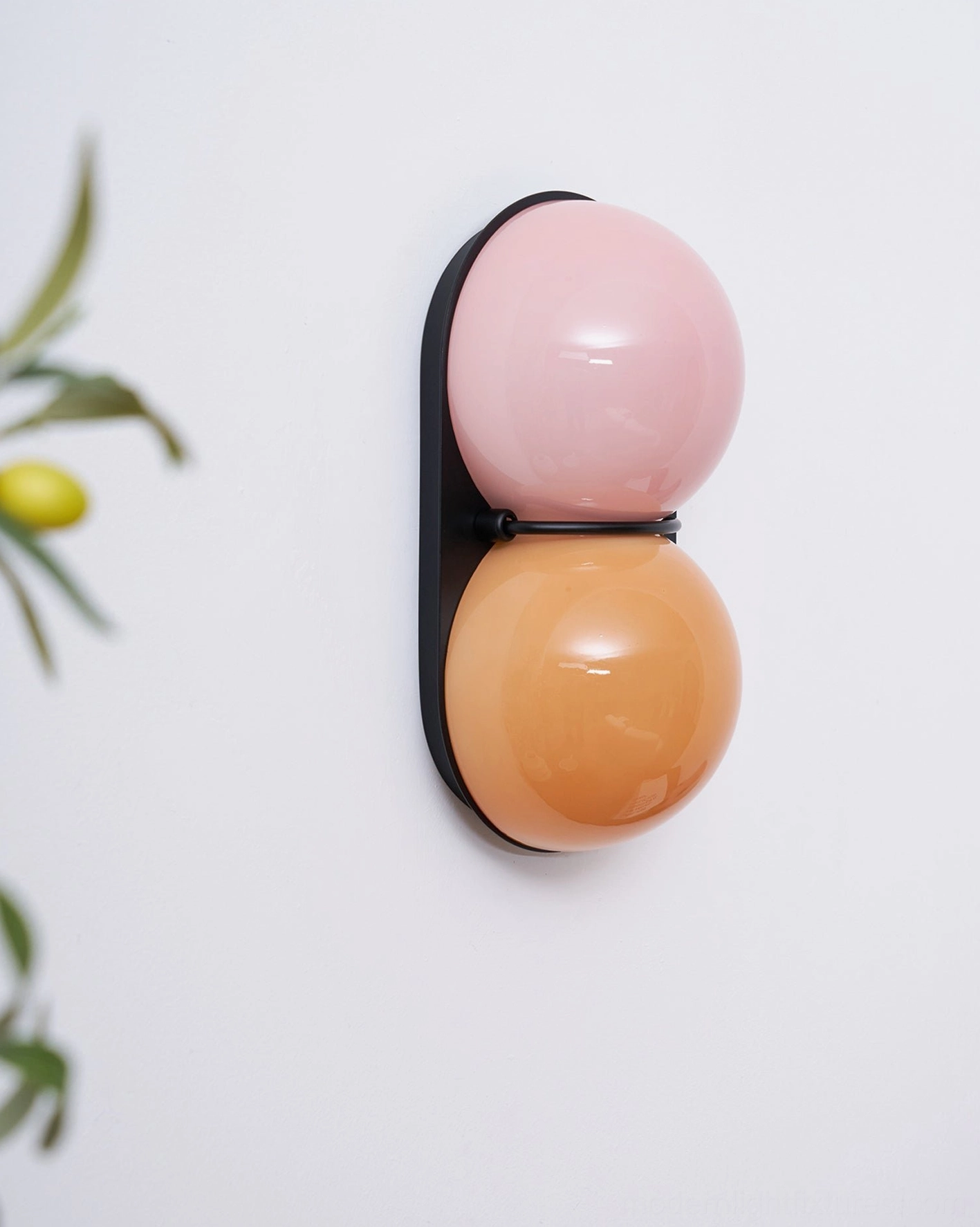 Contemporary Twinwave double glass orb wall sconce fixture with refined minimalist aesthetic