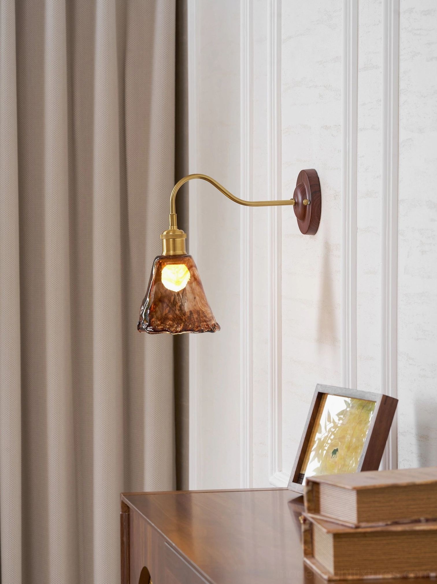 Contemporary wall sconce mounted in sophisticated interior space with modern furnishings and decor