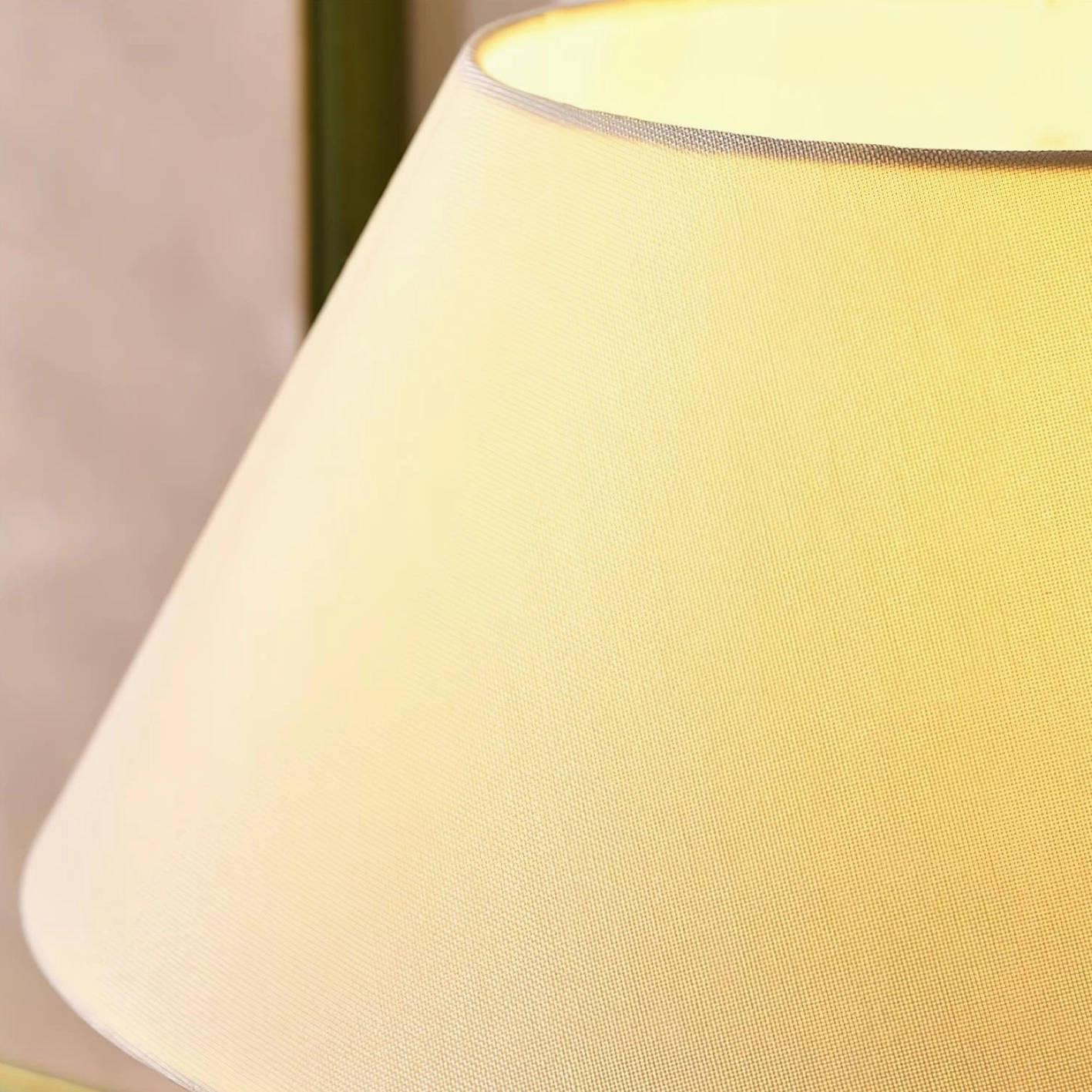 Contemporary table lamp featuring walnut wood stacked base and neutral fabric shade for versatile home decor
