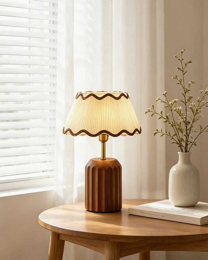 Cordelia vintage pleated table lamp on windowed side table, scalloped trim shade and fluted walnut base with botanical home styling