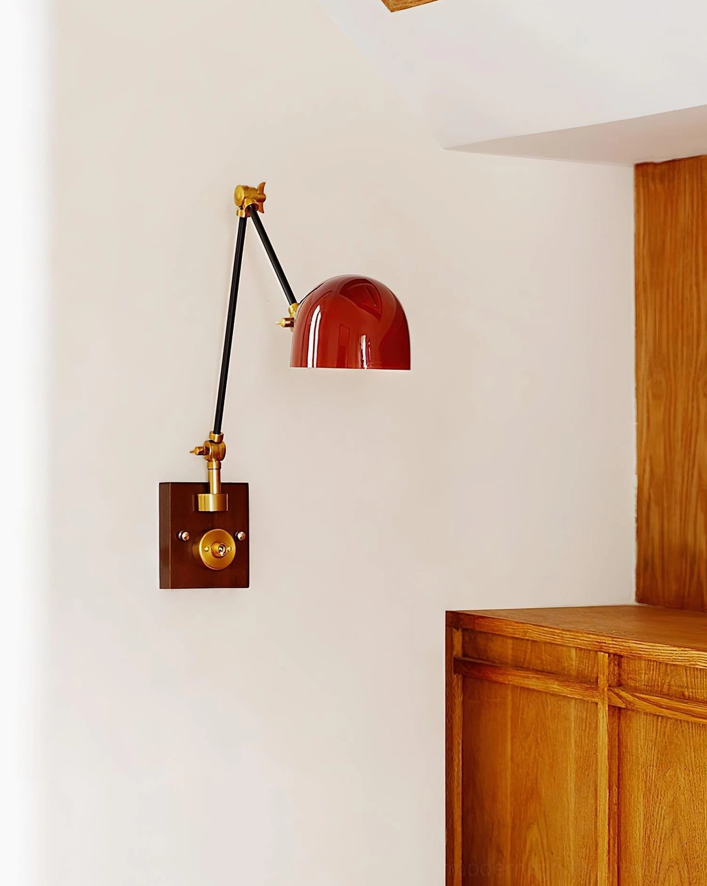 Cordova industrial wall sconce right-side view mounted on corner with burgundy dome shade