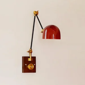 Cordova industrial wall lamp with walnut wood base and black articulating arms, reverse angle view