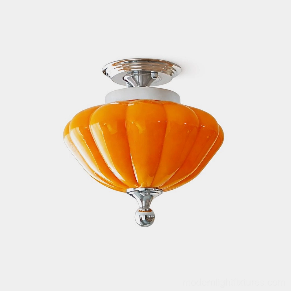 Corenza amber ribbed glass semi-flush ceiling light fixture with chrome canopy on white background, retro pumpkin shape design