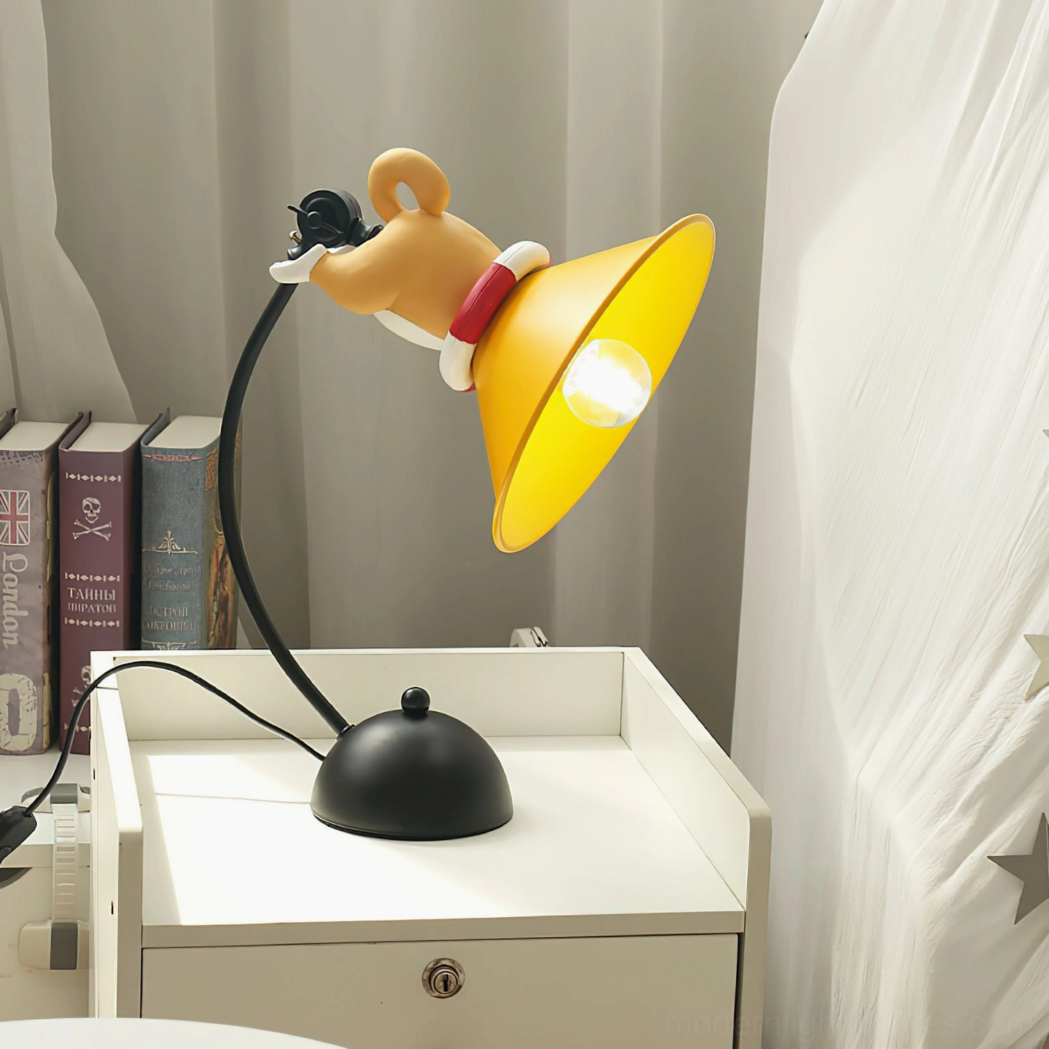 Brightly illuminated corgi table lamp with red collar on nightstand surrounded by stacked books, demonstrating warm ambient glow and bedroom placement