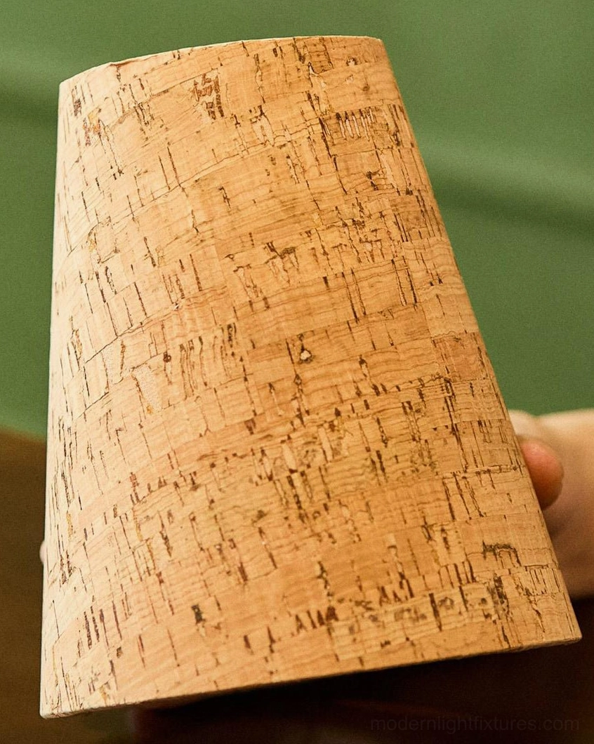 Corkelle table lamp with tapered cork shade and turned walnut base, angled three-quarter view