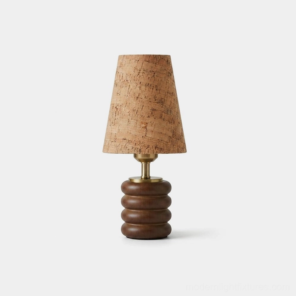 Corkelle walnut wood table lamp with natural cork tapered shade and brass stem, studio front view