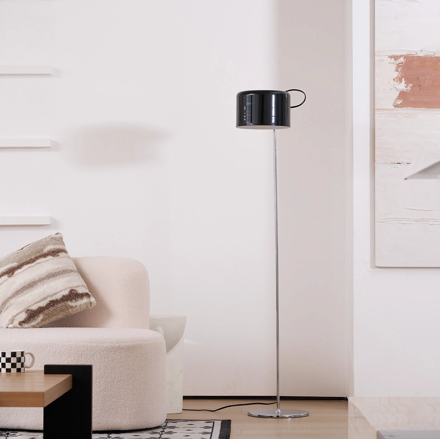 Contemporary adjustable floor lamp with polished chrome finish in upscale home interior