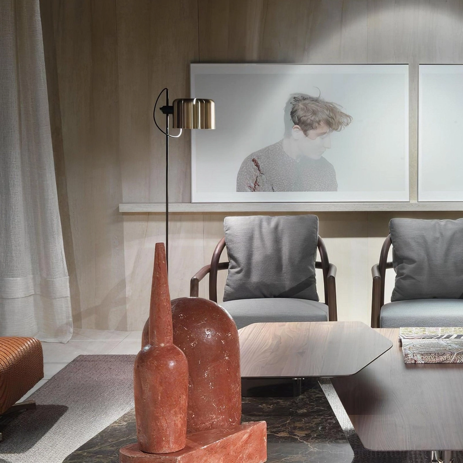 Contemporary adjustable floor lamp with chrome and black finish options in styled interior