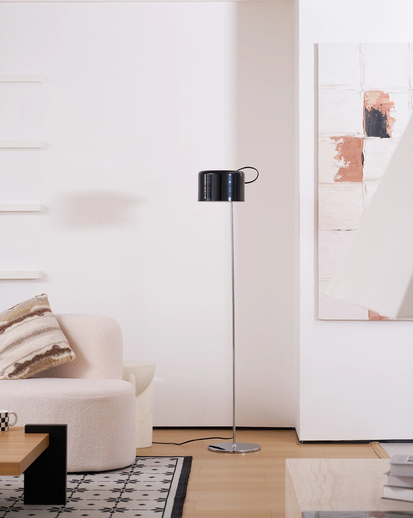 Coupé modern floor lamp with adjustable head in refined living room setting with neutral tones
