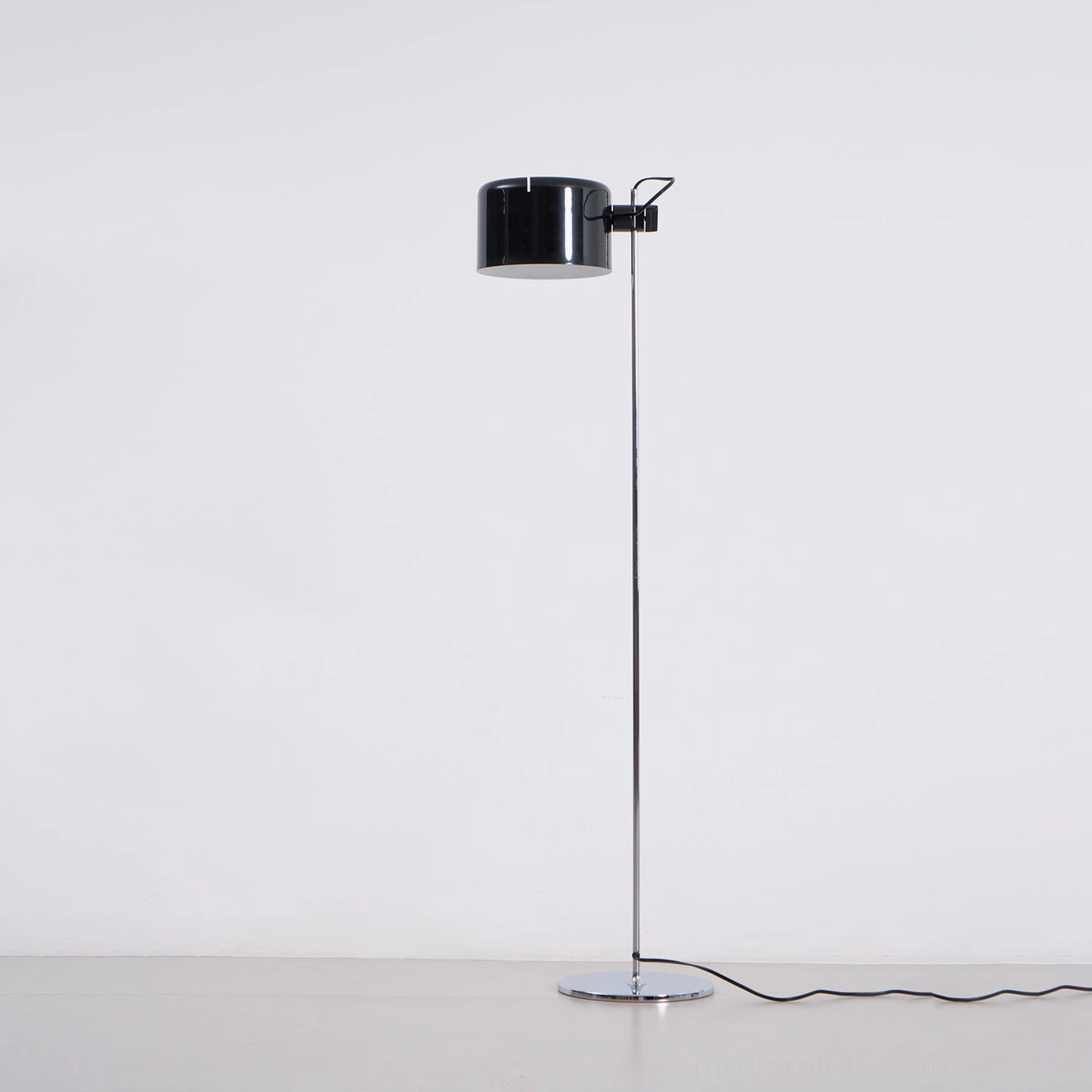Contemporary adjustable floor lamp in minimalist interior with clean geometric silhouette