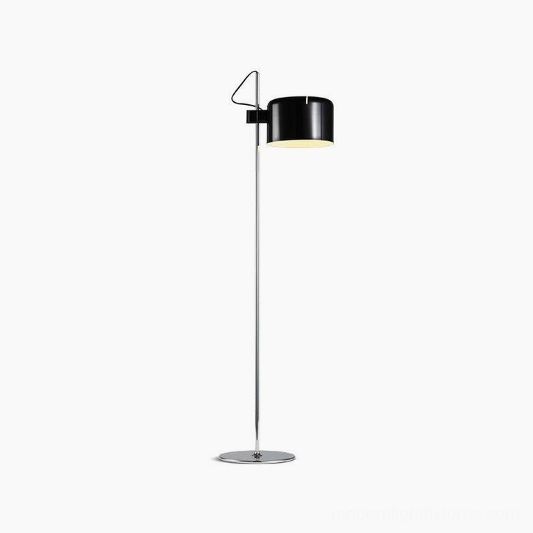 Modern metal floor lamp with polished finish and adjustable positioning in luxury interior