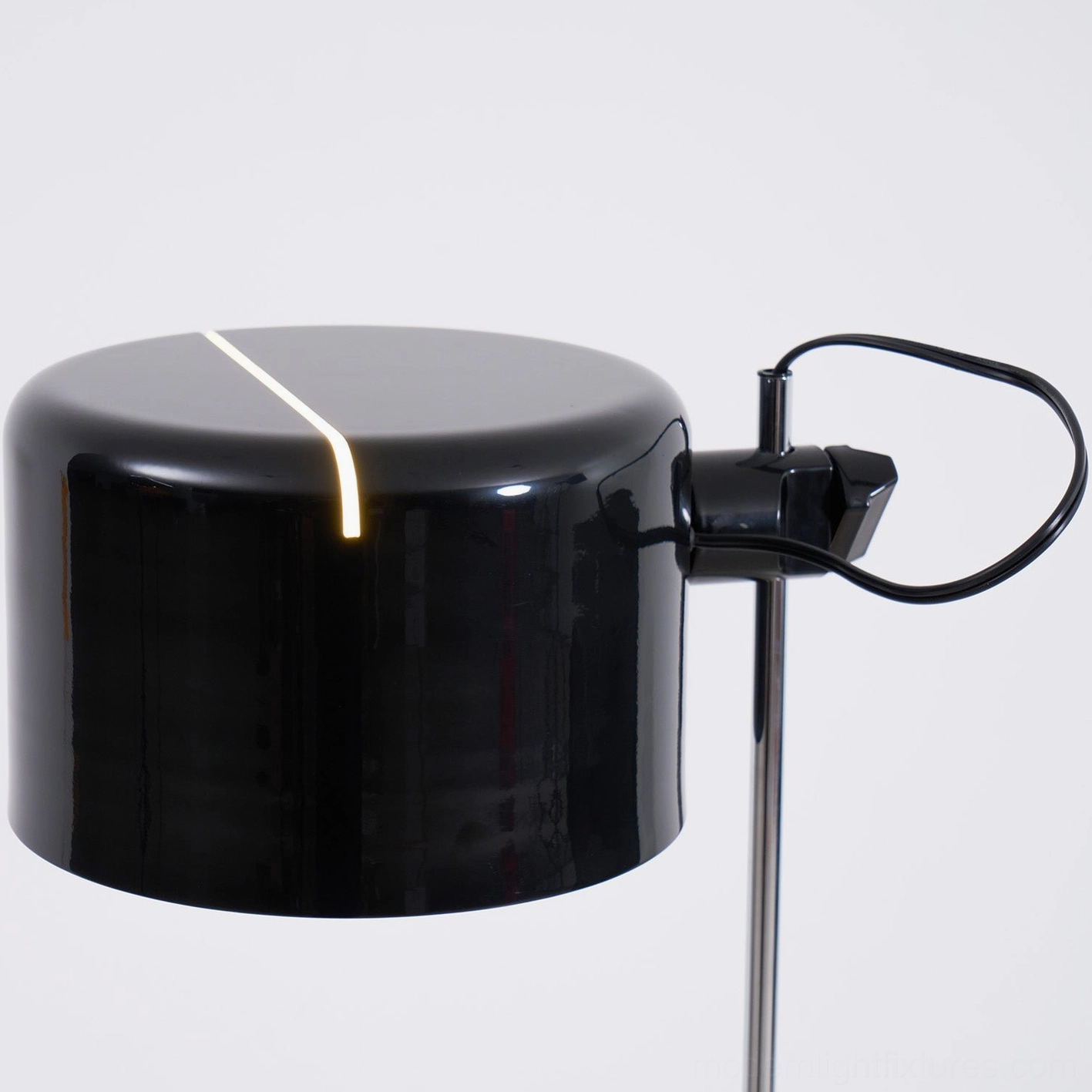 Coupé adjustable floor lamp in mid-century modern inspired interior design setting