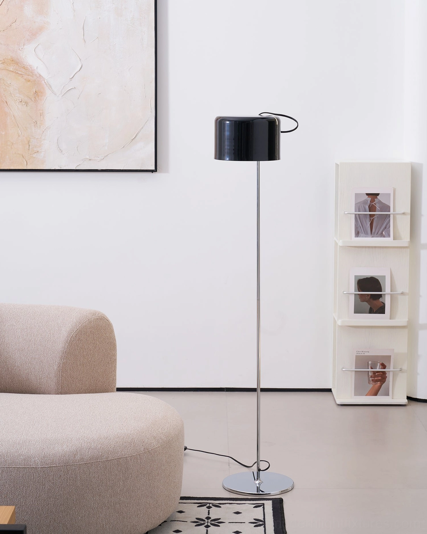 Coupé floor lamp showcasing three-directional movement in sophisticated interior styling