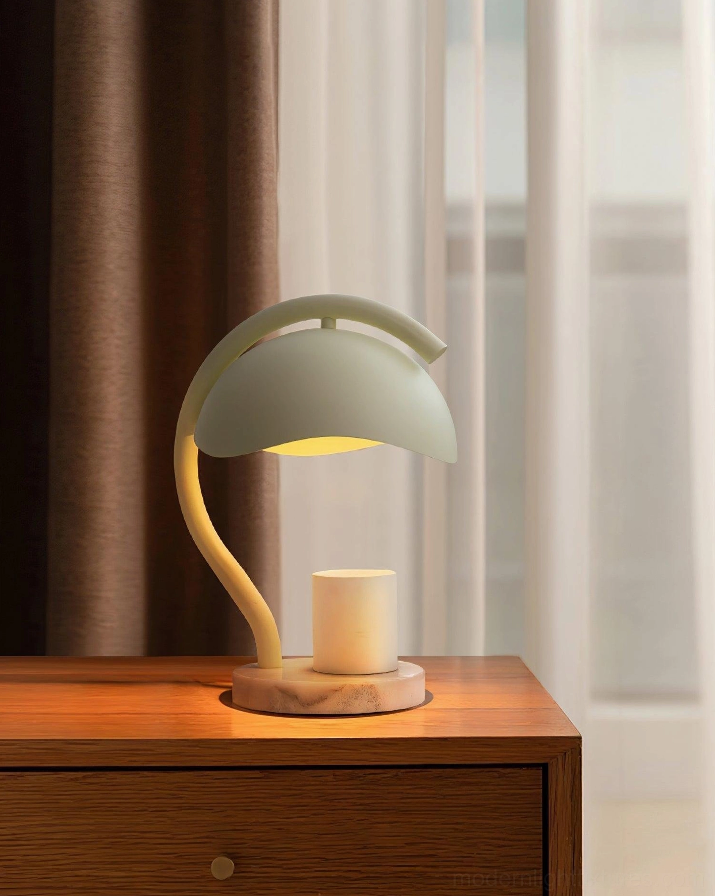 Soft glowing candle warmer table lamp on wooden nightstand by window with warm white 3000K LED light and marble base