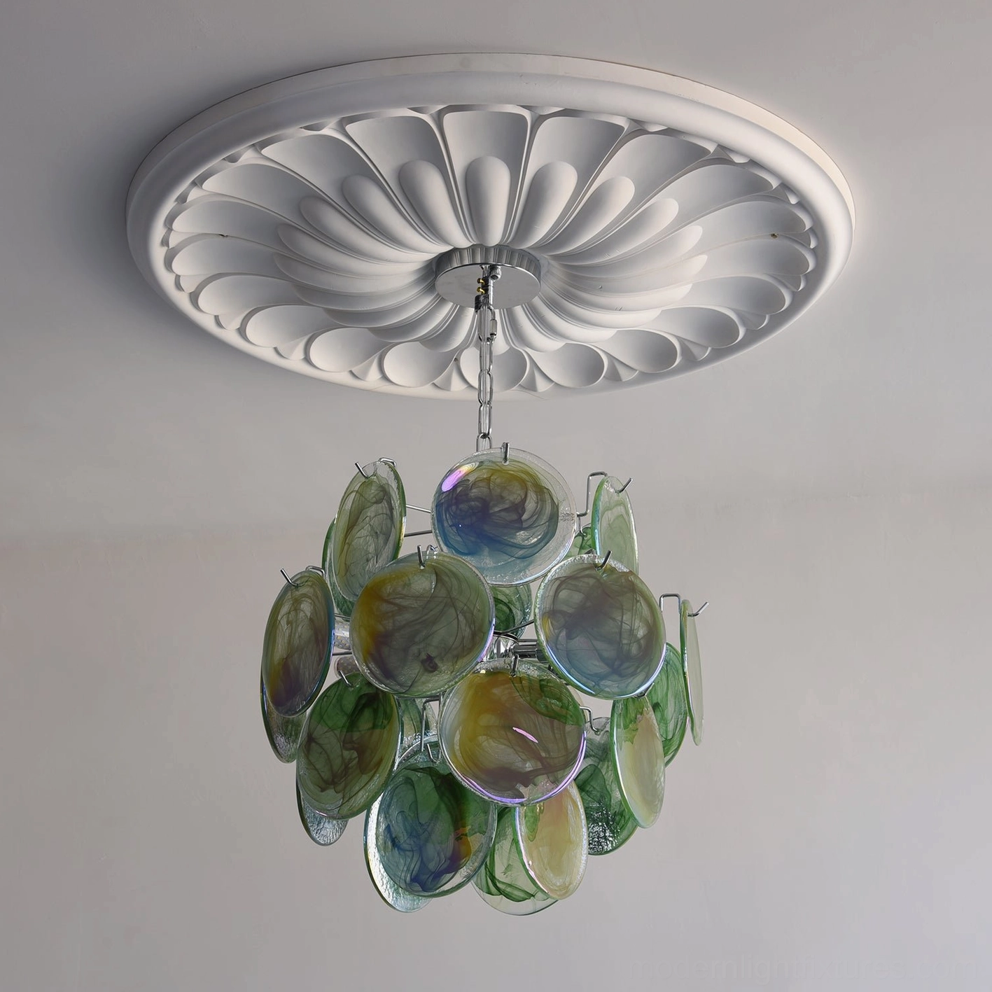 Cream color glass disc chandelier variant with pastel hue and layered disc arrangement